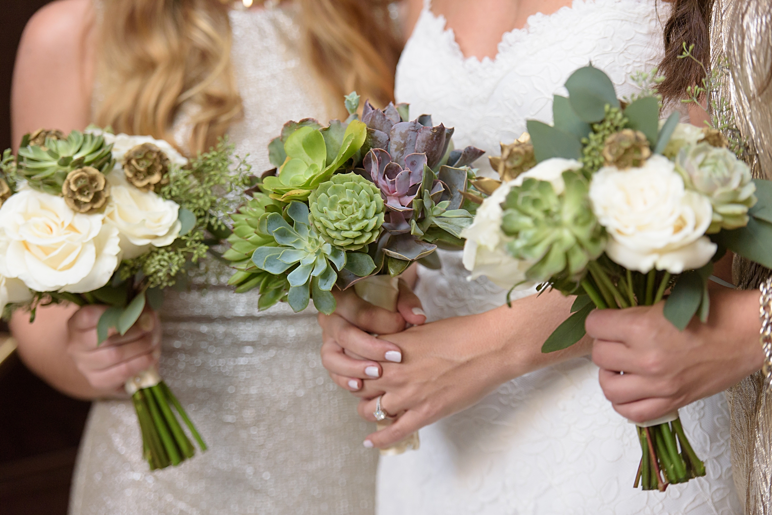 Bridal florals held by the Bride and her Bridesmaids