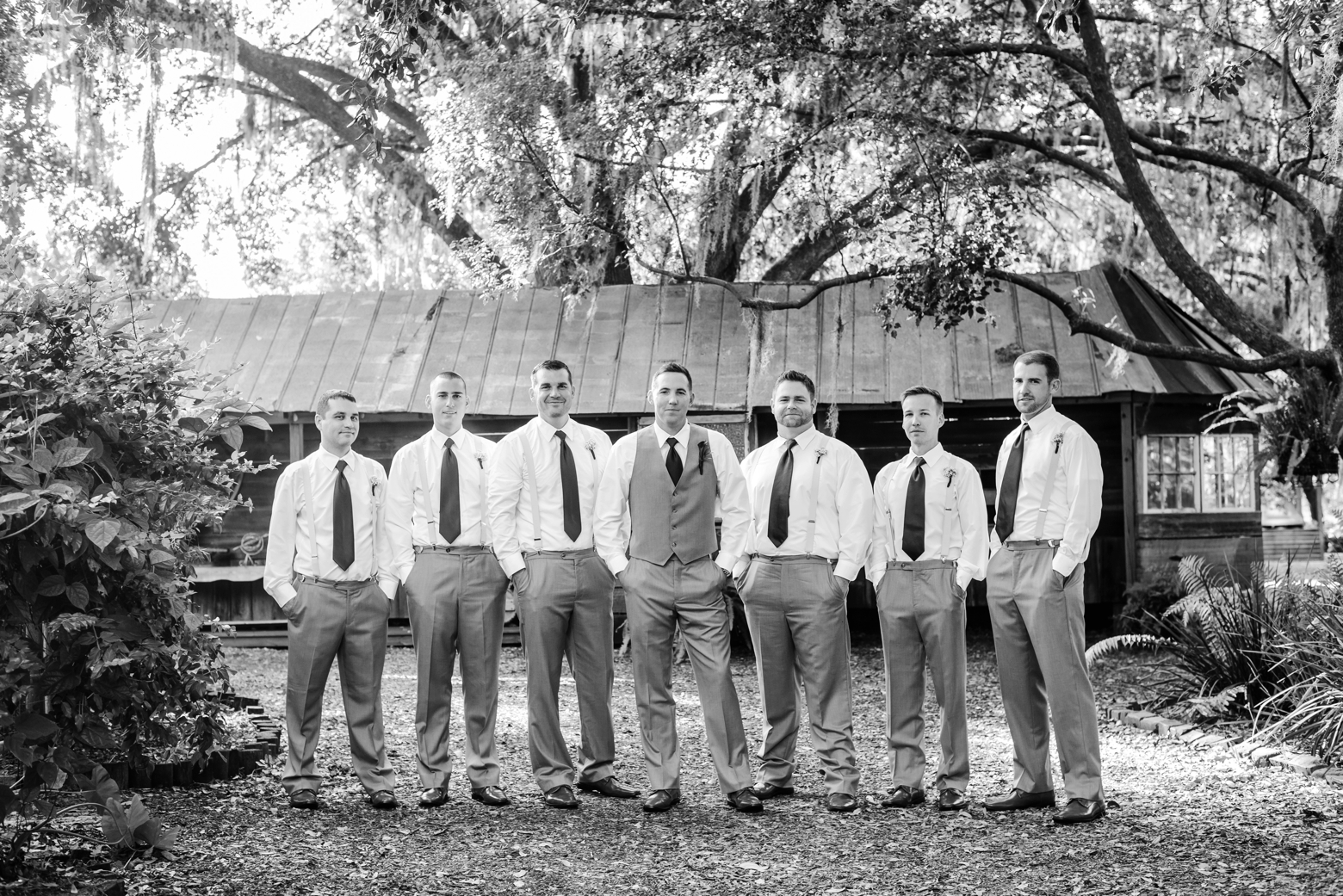 The Groom and his Groomsmen in a formal black and white portrait