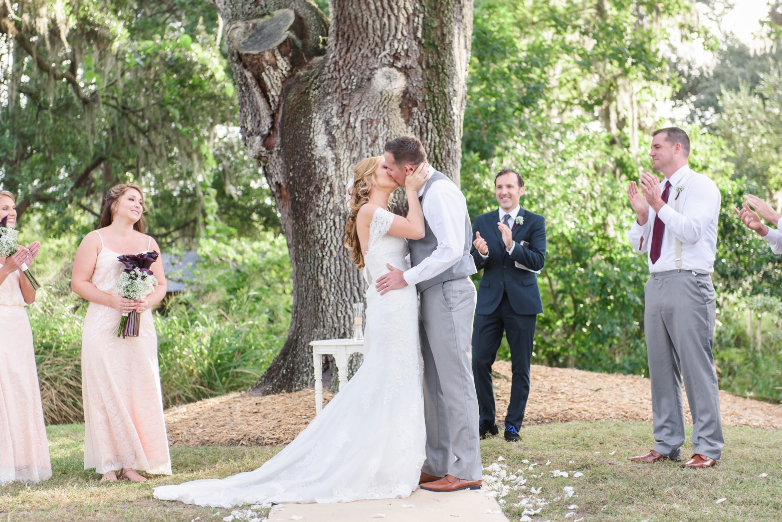 The first kiss as Husband and Wife on their Cross Creek Ranch Wedding day