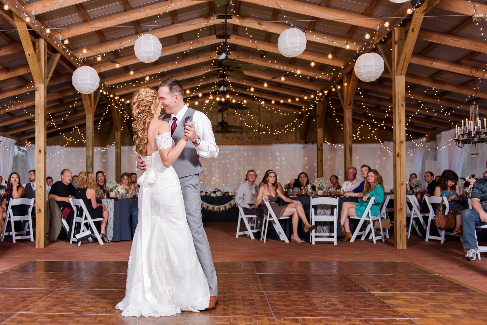 Bride and Groom dance to their first song as Husband and Wife by Sarah and Ben Photography