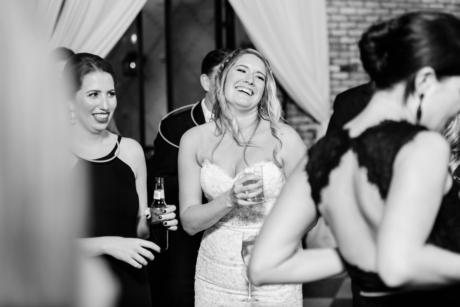 The Bride laughs during the reception of her oxford exchange wedding day