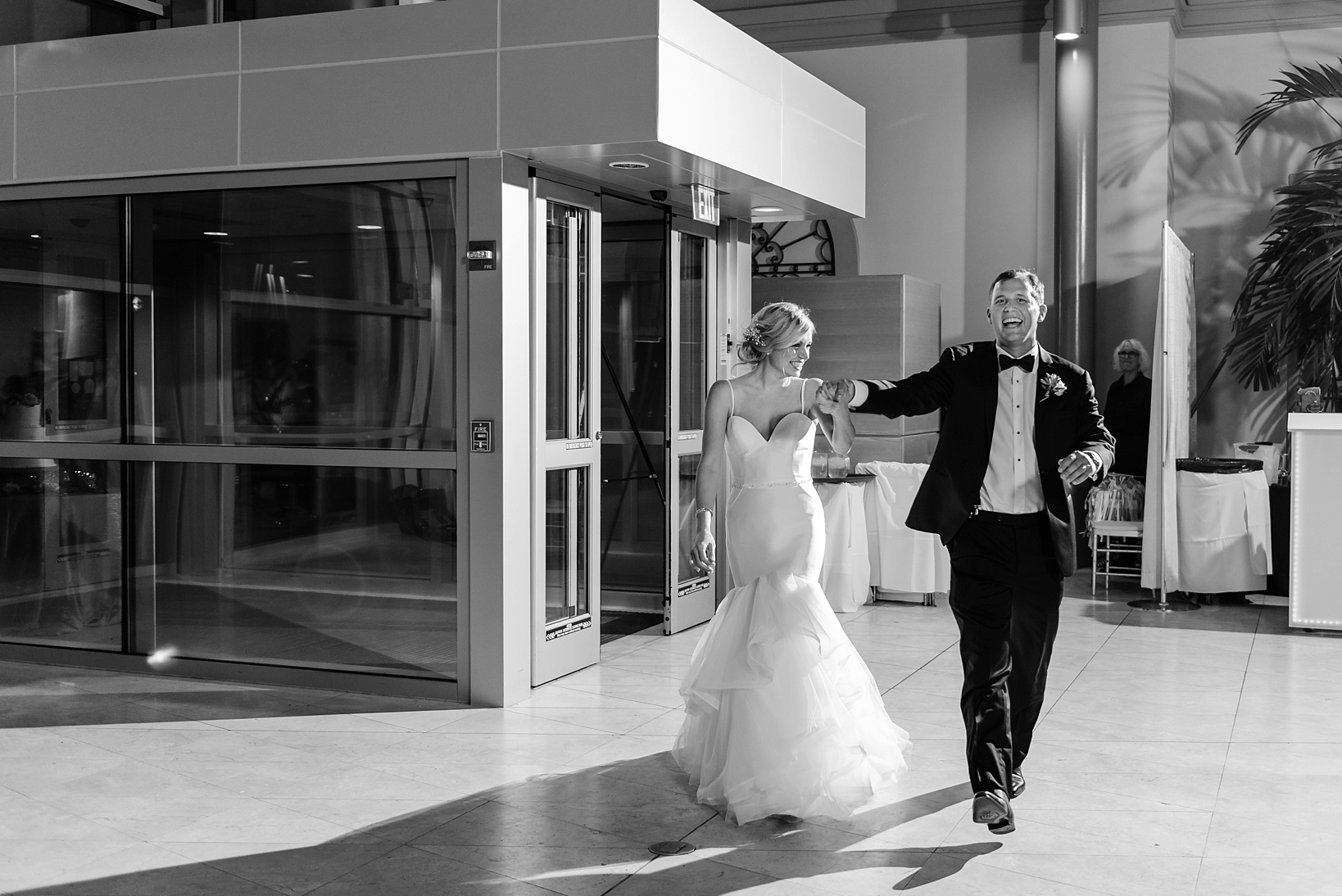 The Bride and Groom enter their reception dancing and laughing