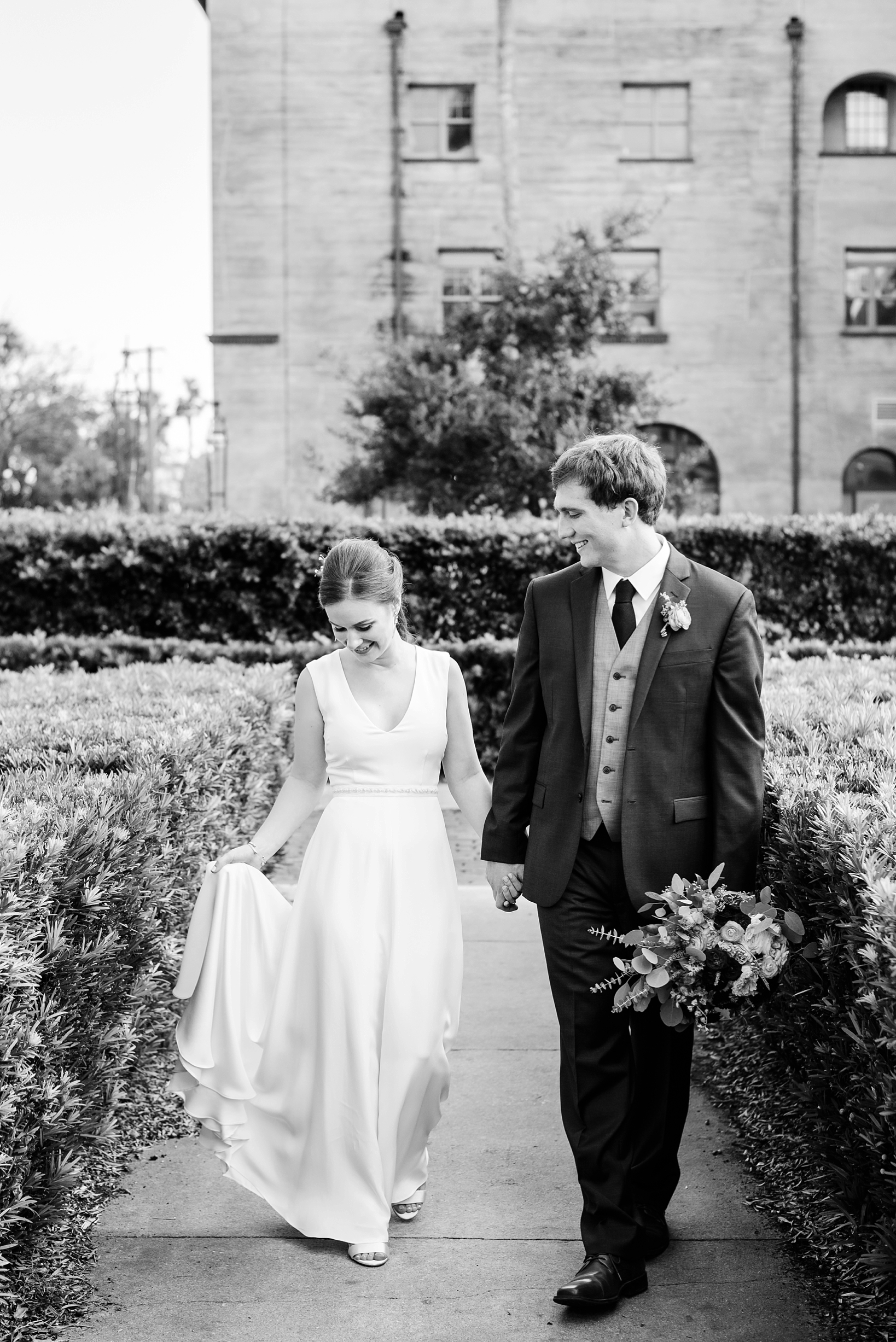 Bride and groom sharing a laugh in St. Augustine, FL by Sarah & Ben Photography