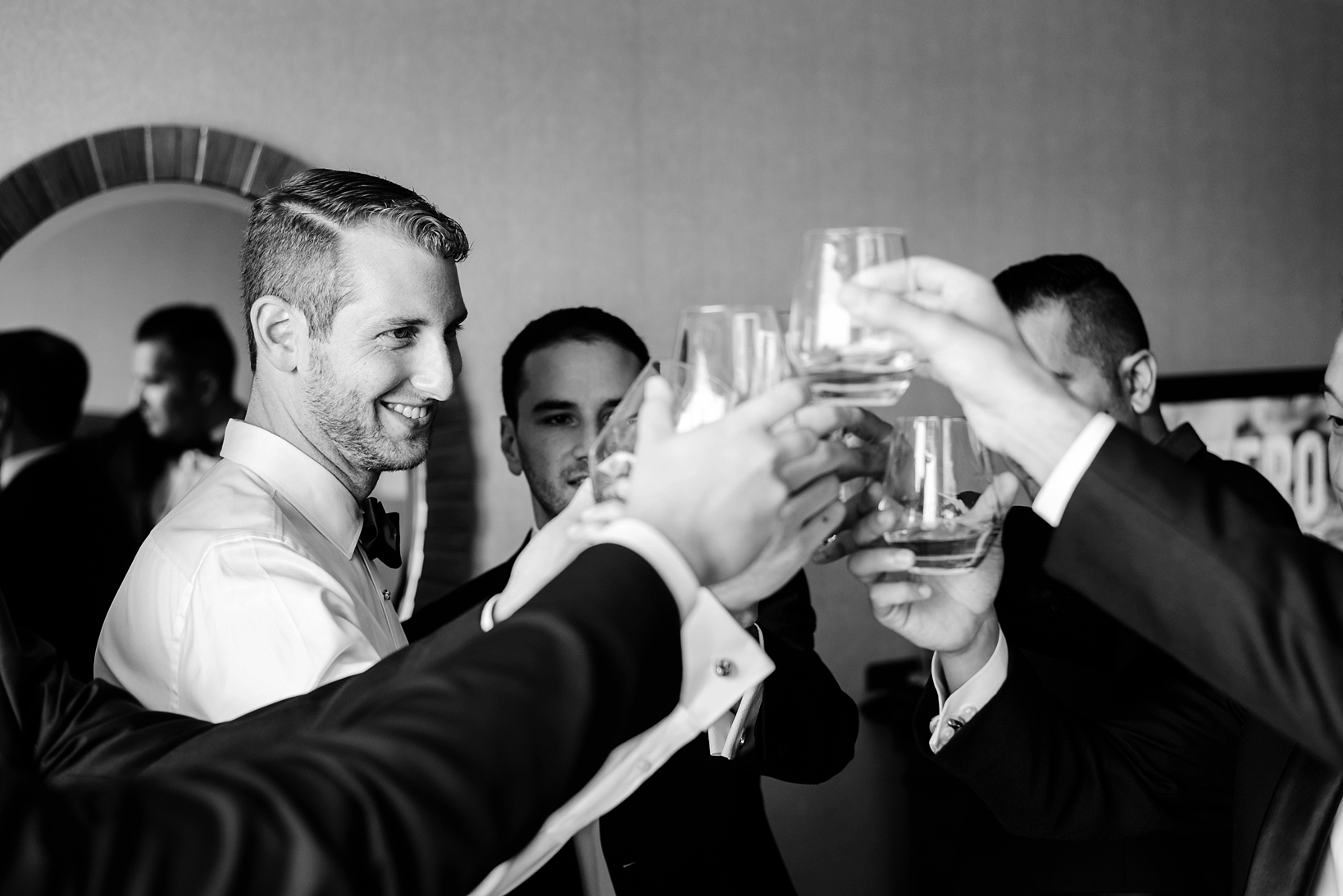 Groom and his groomsmen toast to his wedding with Johnny Walker Blue whisky 
