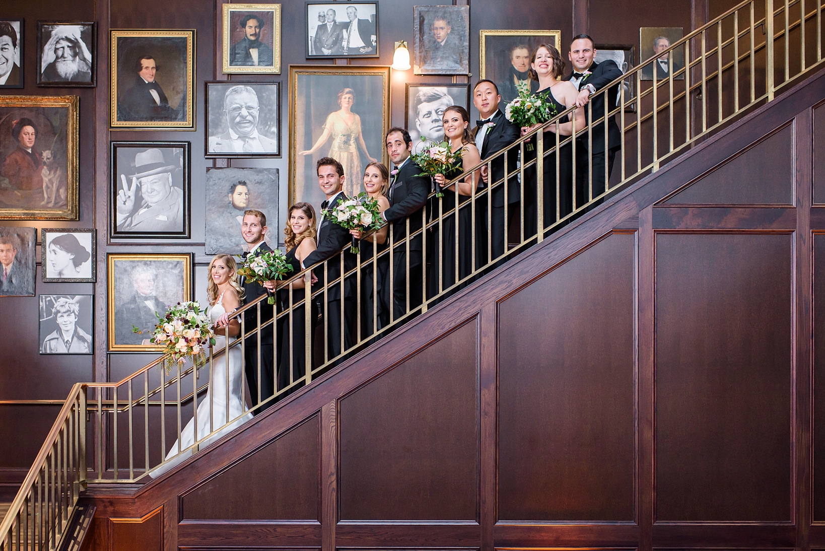The complete bridal party on the steps of Oxford Exchange in Tampa, FL