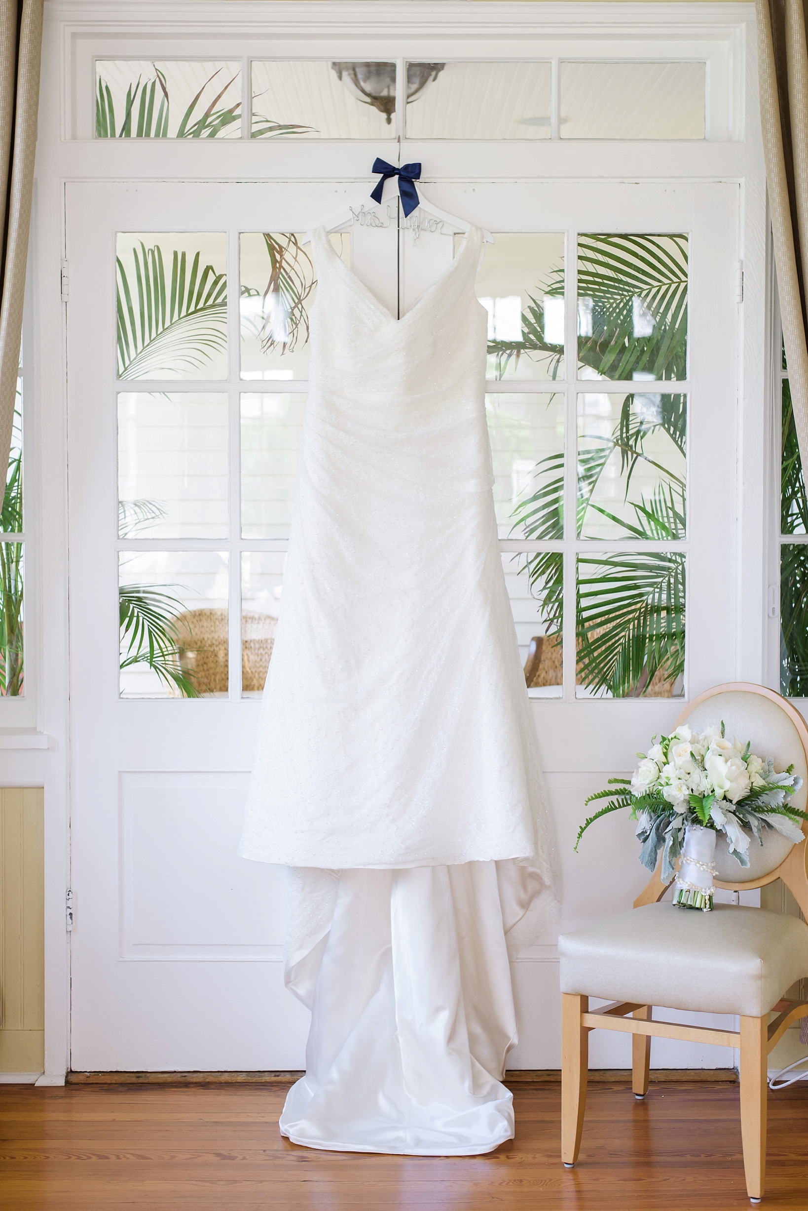 The wedding dress hanging in the sun room of the Palmetto Riverside B&B