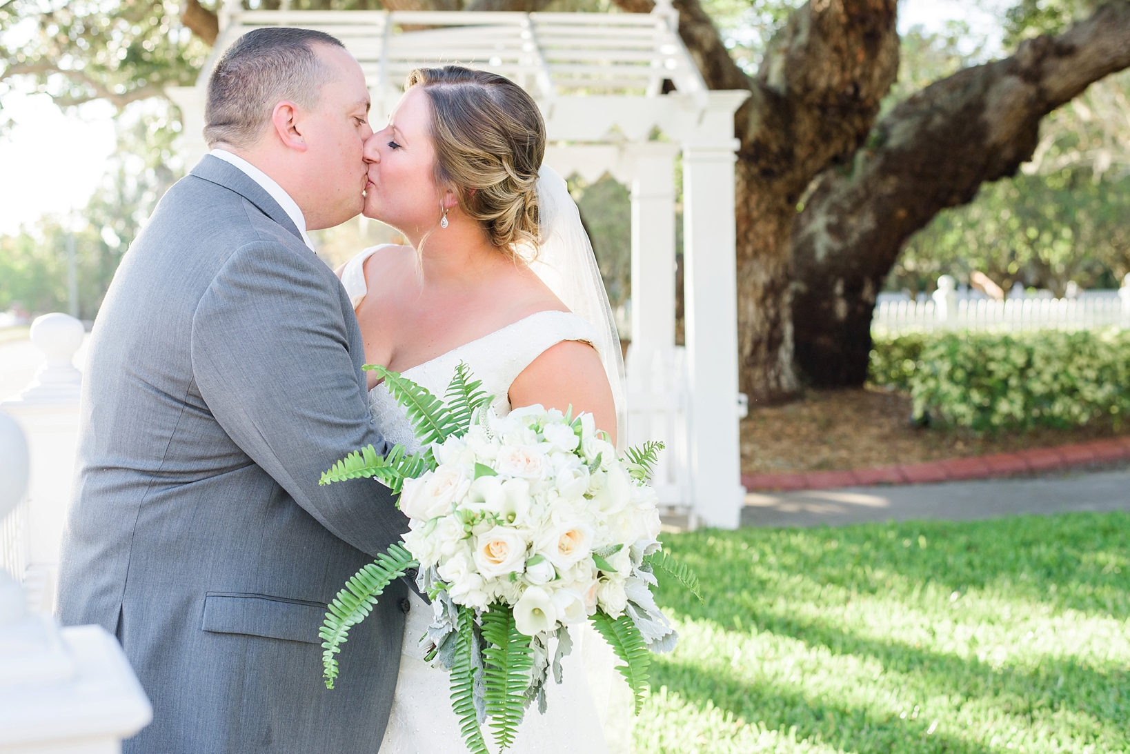 Bride and Groom share an intimate moment on the lawn of the Palmetto Riverside B&B