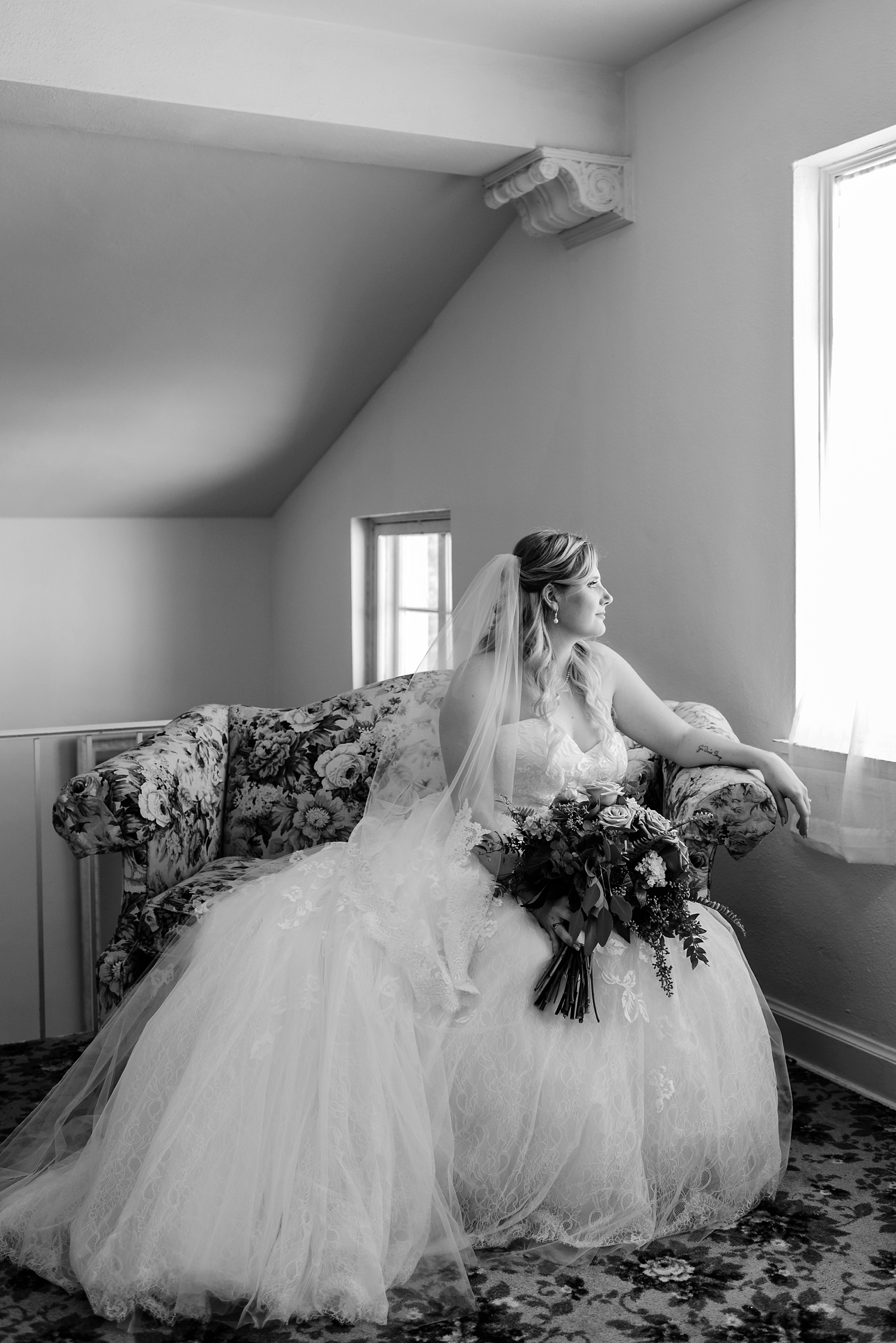 Black and white image of a classic photo of the bride before her ceremony
