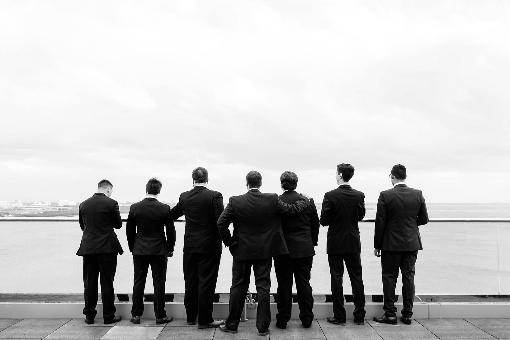 Classic portrait of the Groom and his Groomsmen in Black and White by Sarah & Ben Photography
