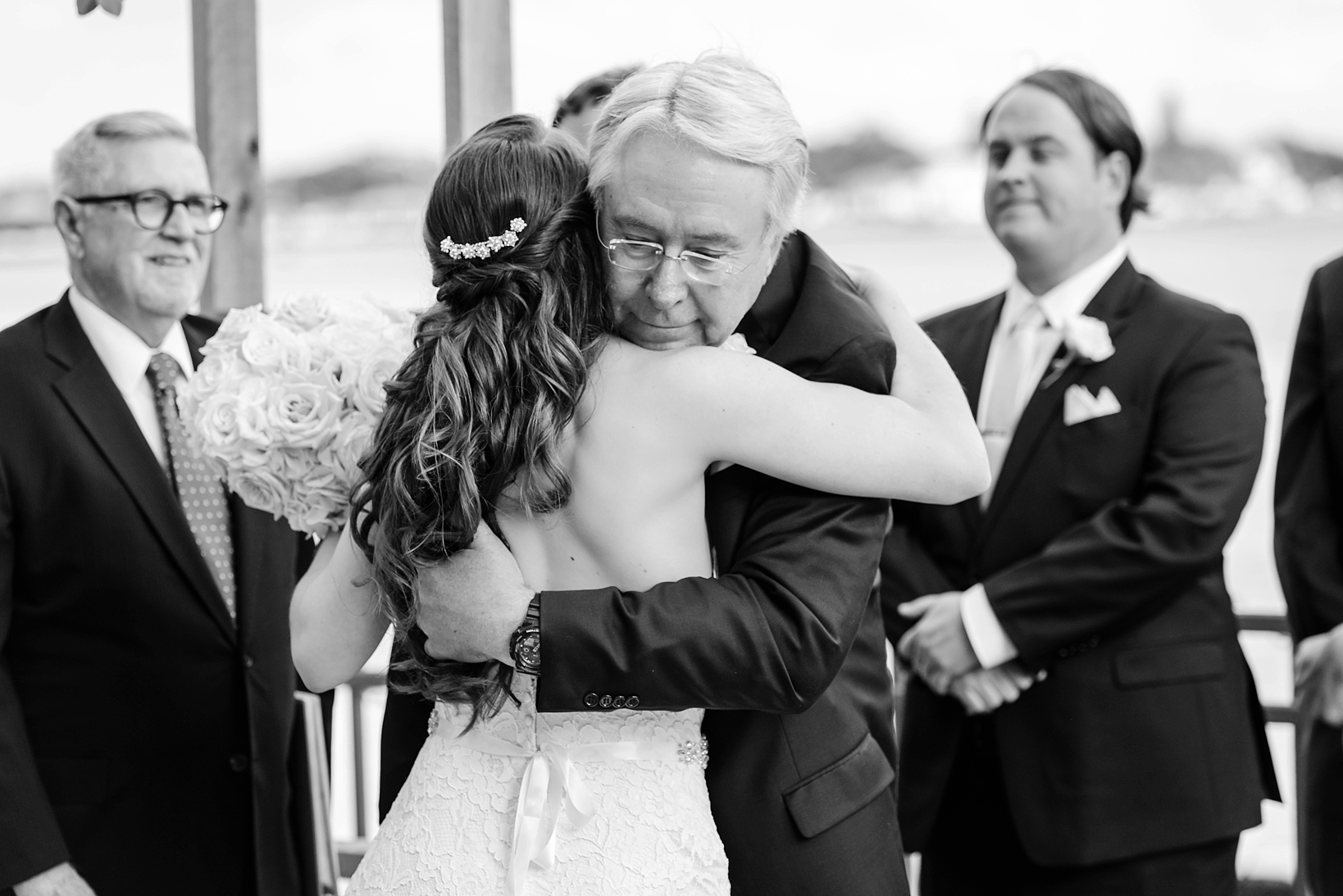 Father and Daughter embrace as he gives her away on her wedding day