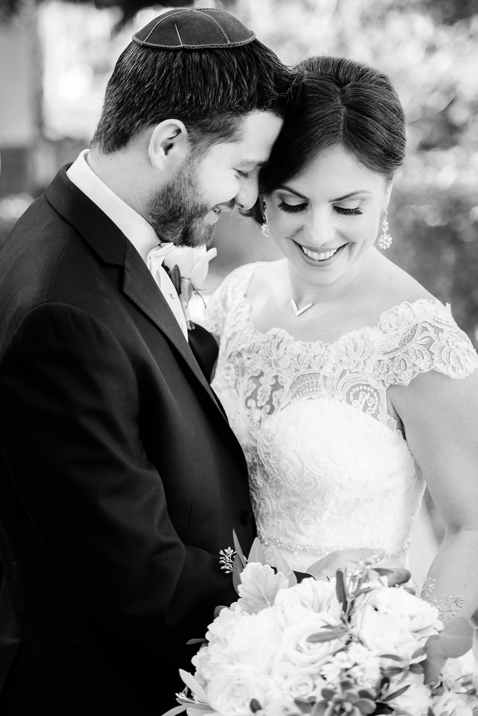 Black and White image of the bride and groom by Sarah & Ben Photography