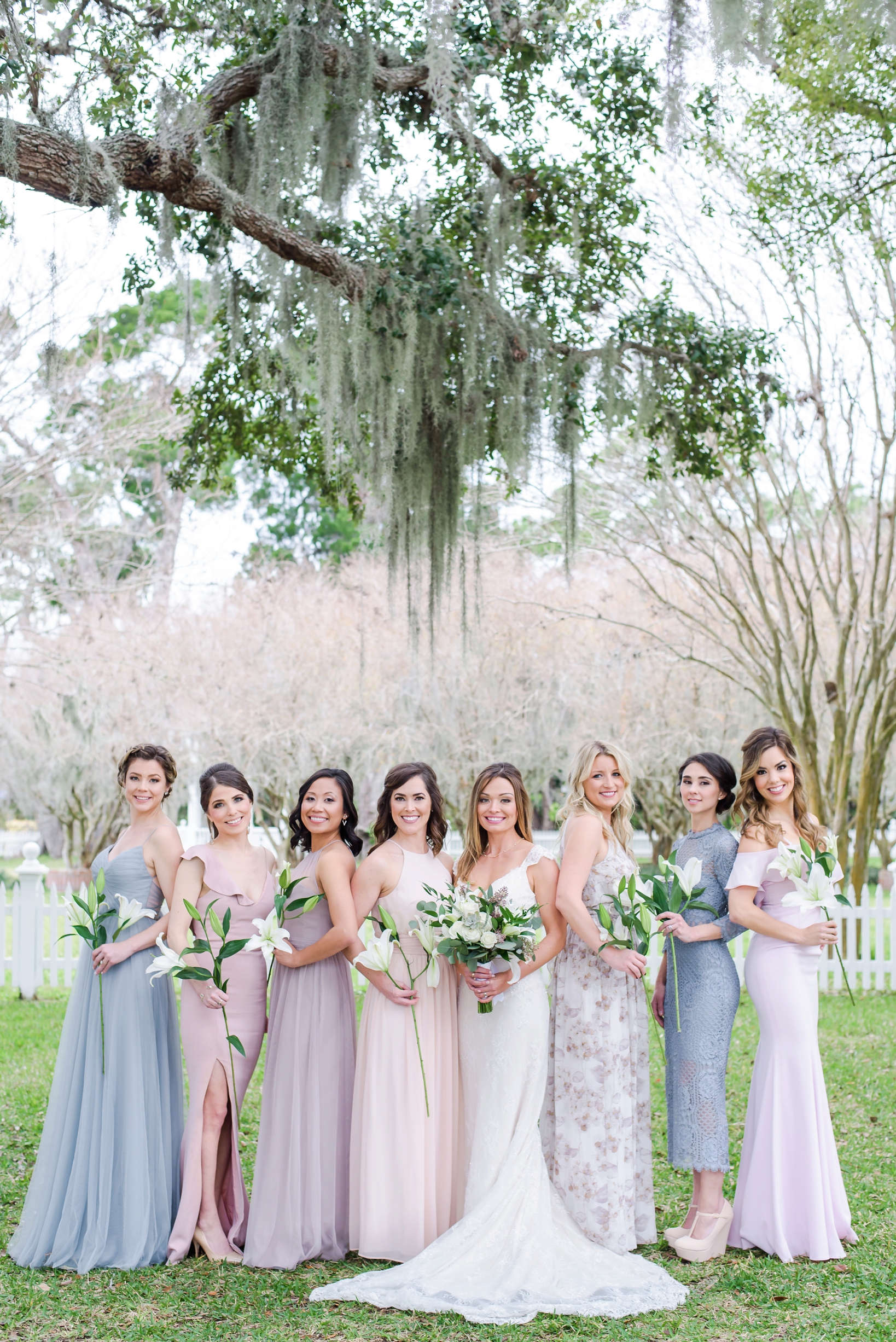Bride with her Bridesmaids under the oak tree at the palmetto riverside BnB