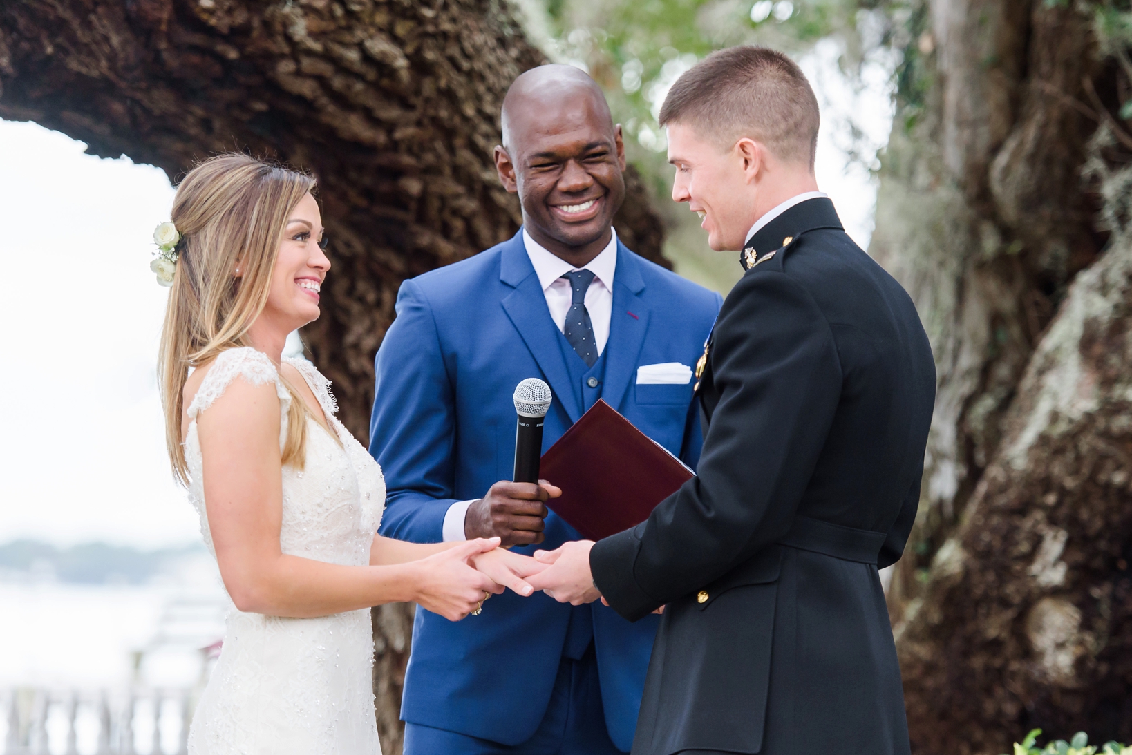 Exchanging vows with their friend as their officiant 