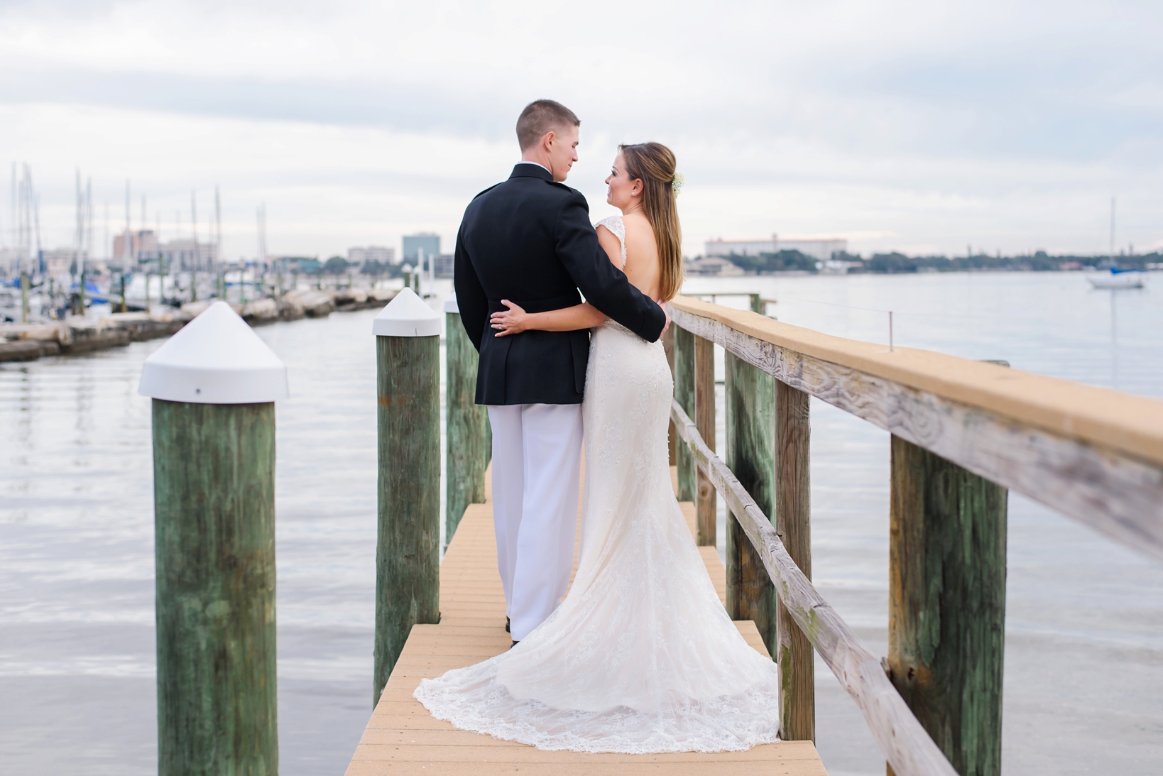 Bride and groom on the dock