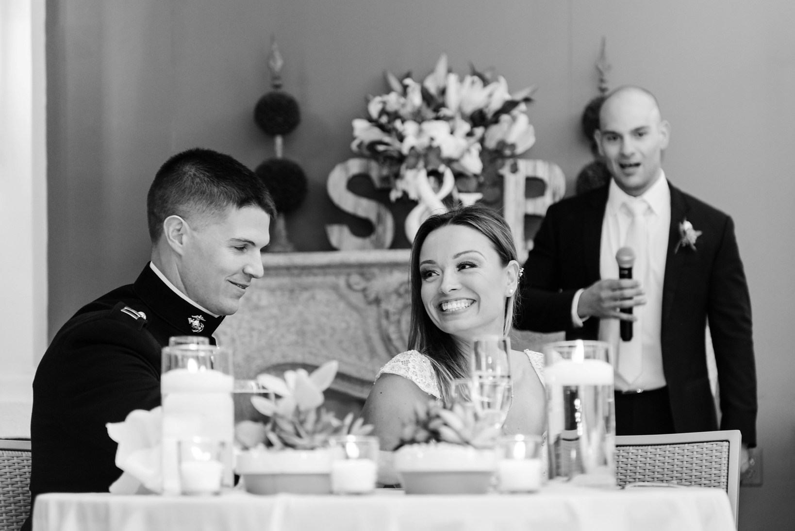 Bride and Groom laughing during the speeches