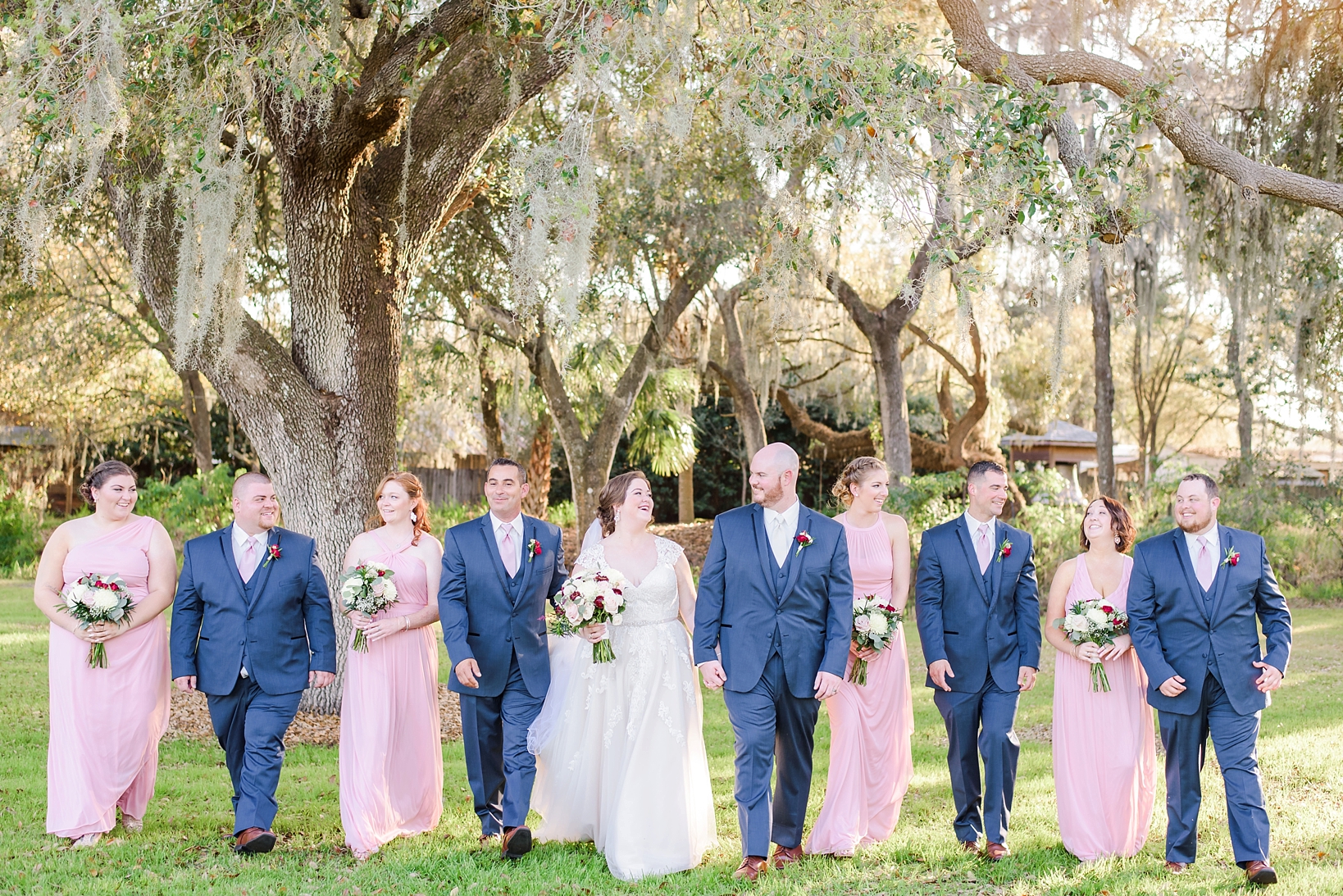 The bridal party in navy and blush in rustic, FL