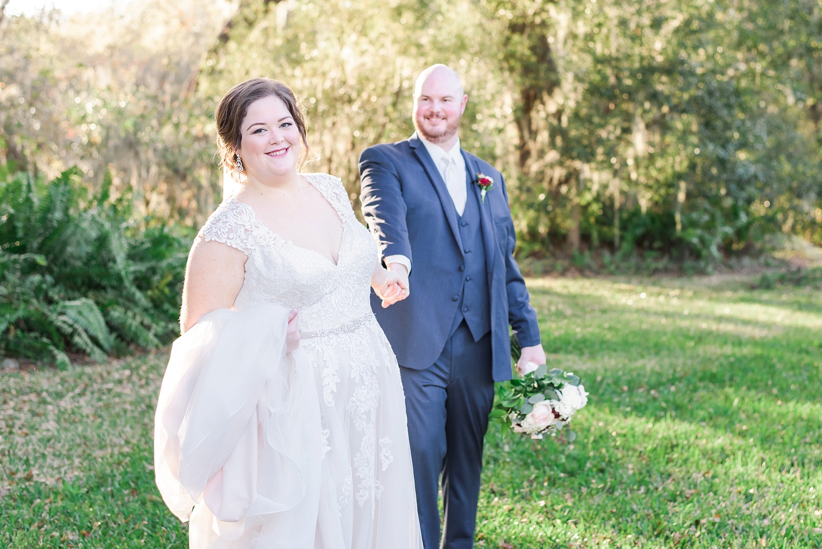 Bride leading her groom across the lawn at cross creek ranch by Sarah & Ben Photography
