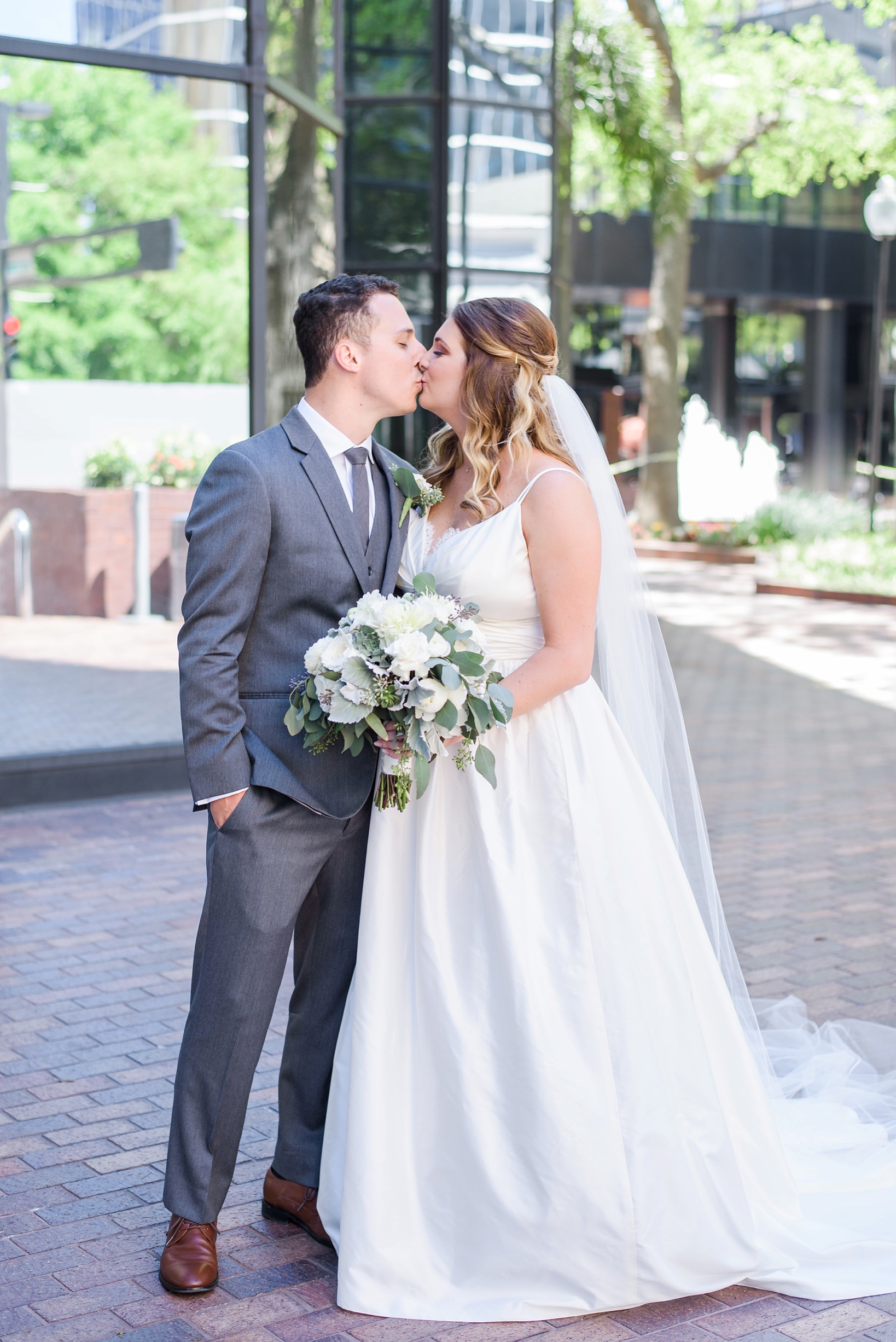 Bride and Groom kissing in Downtown Tampa, FL