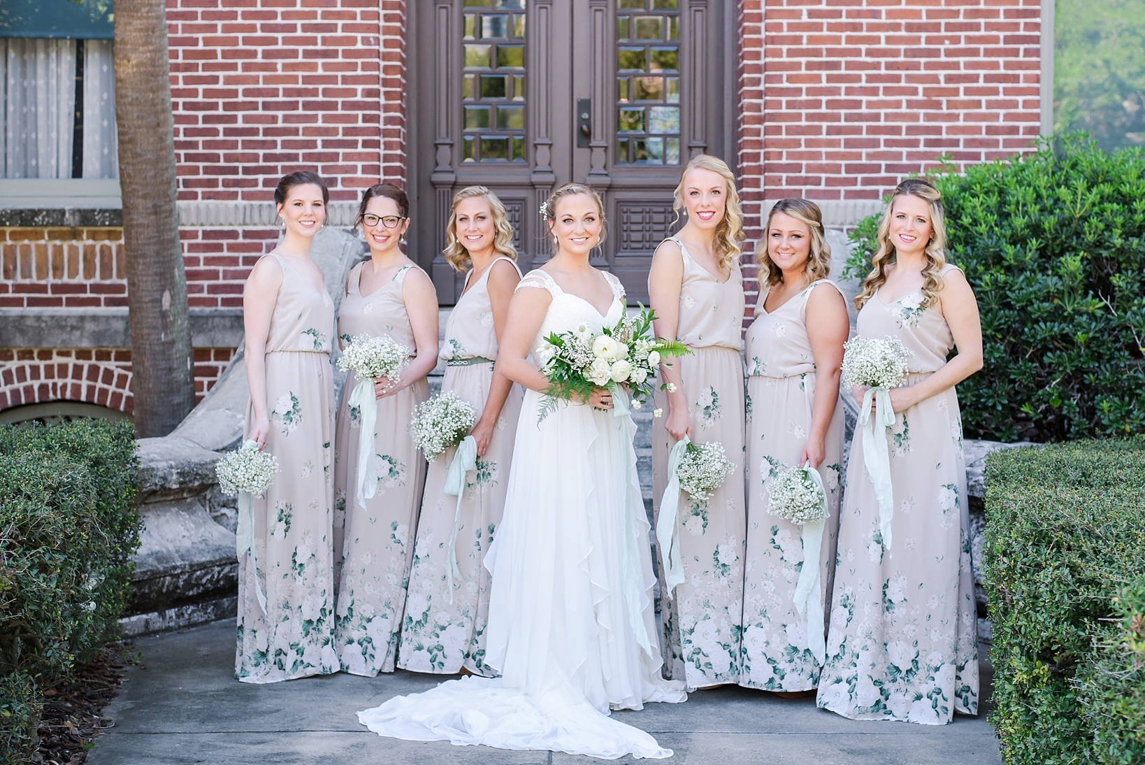 Bride and her Bridesmaids in floral matching dress