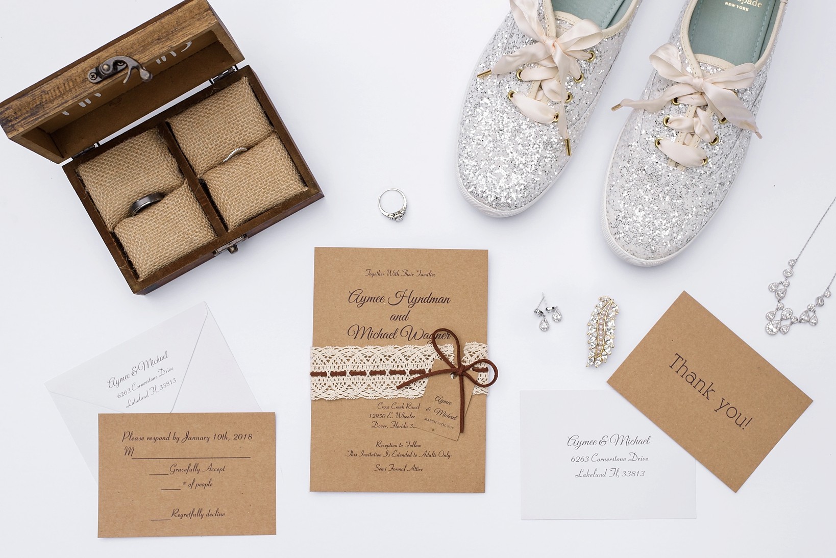 Kate Spade Wedding shoes surrounded by wedding invitations and bride's jewellery 