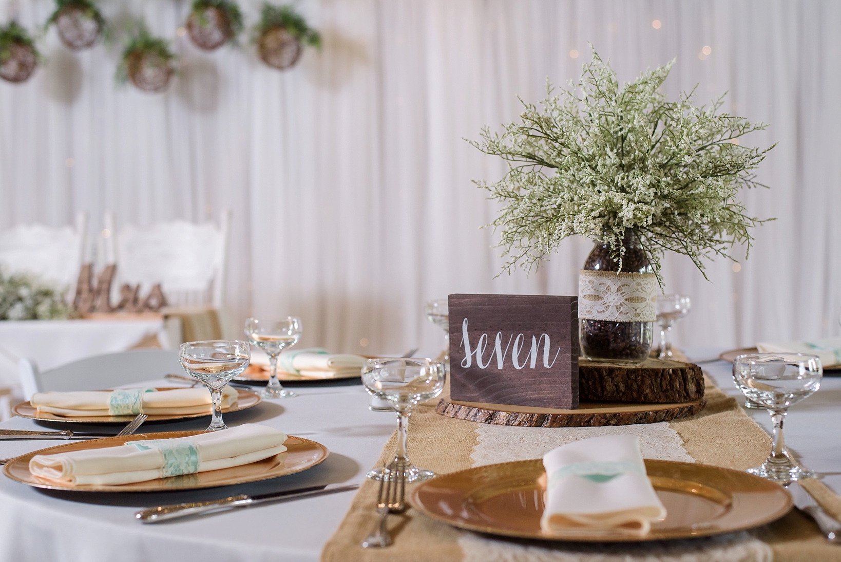 cross creek ranch reception details of table numbers and baby breath florals