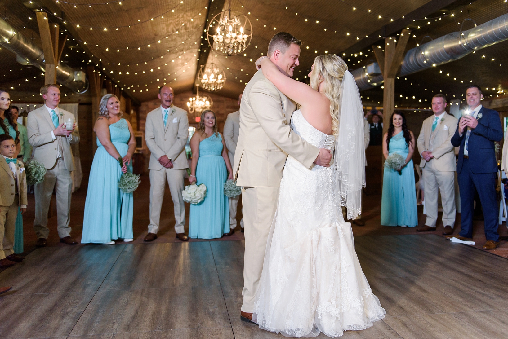 Bride and Groom's first dance in the barn of their Cross Creek Ranch reception