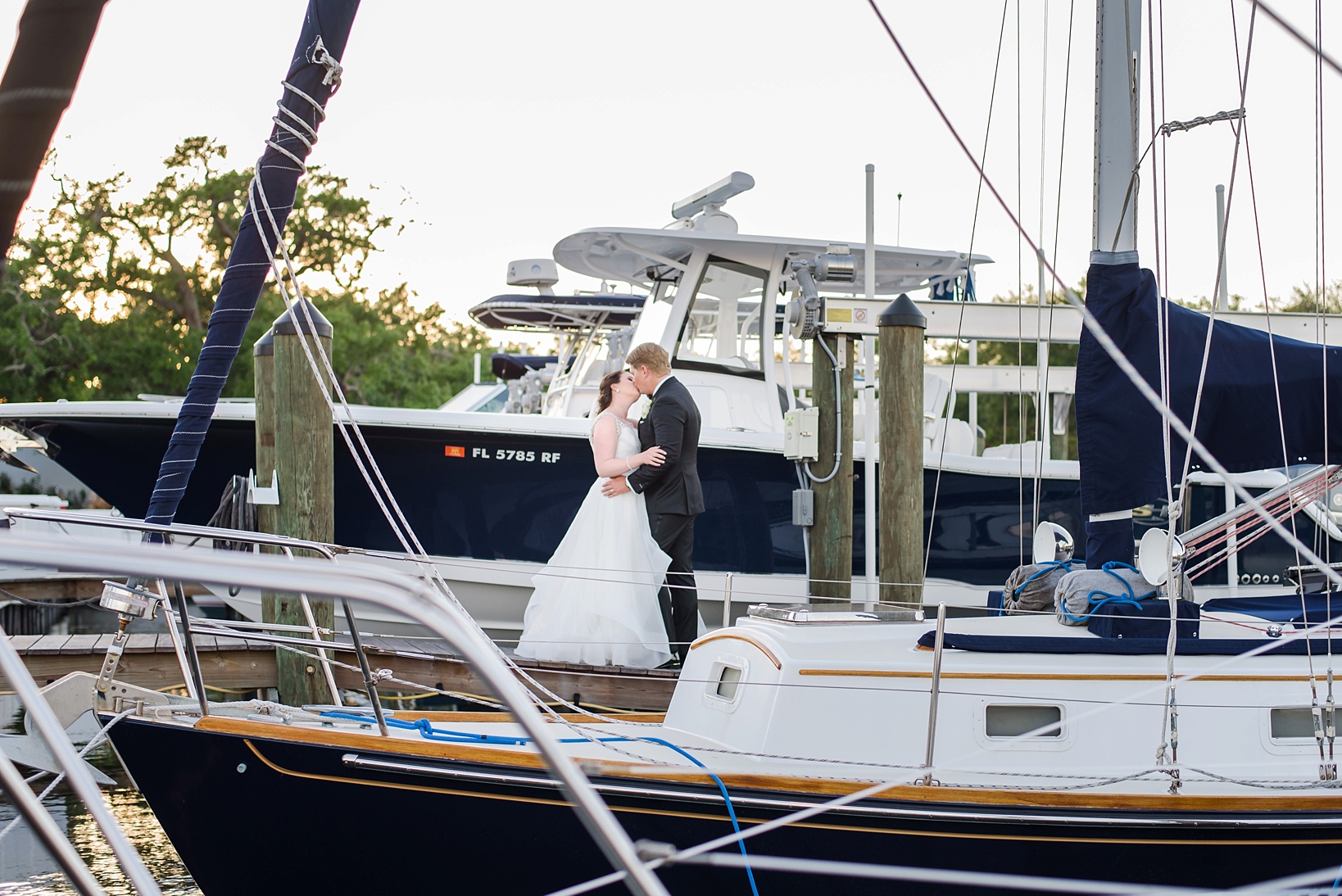 Bridal portrait amongst the boats of the Tampa yacht and country club by Sarah & Ben Photography