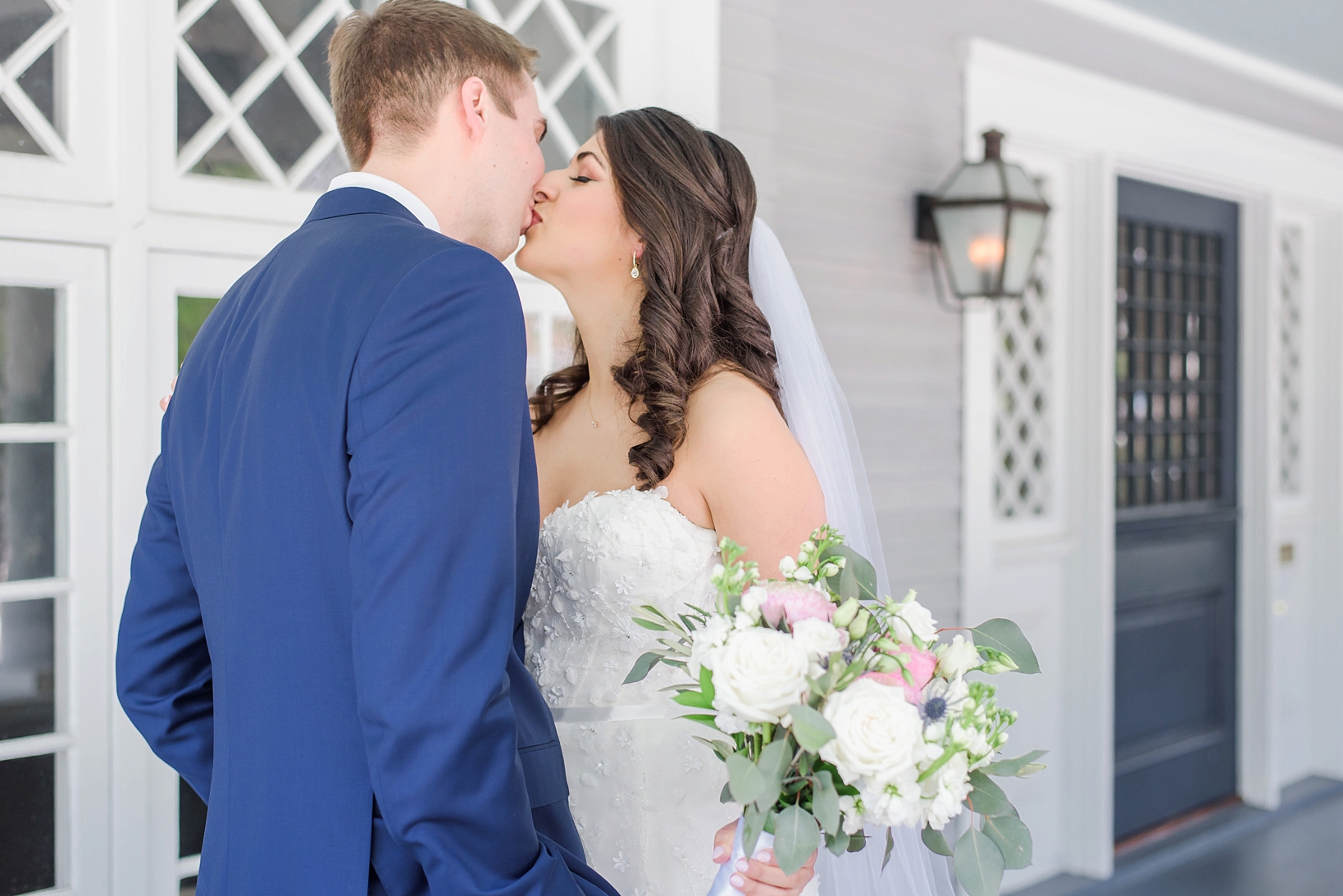 Bride and Groom kiss after seeing each other for the first time on their wedding day