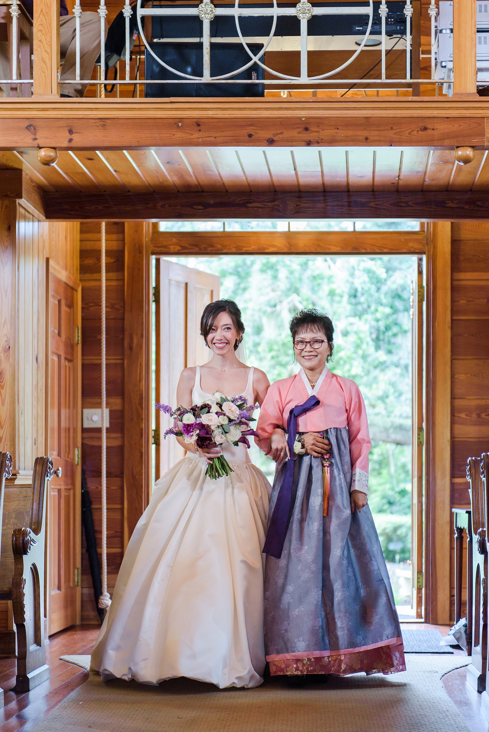 Bride and Mom walk down the aisle by Sarah & Ben Photography