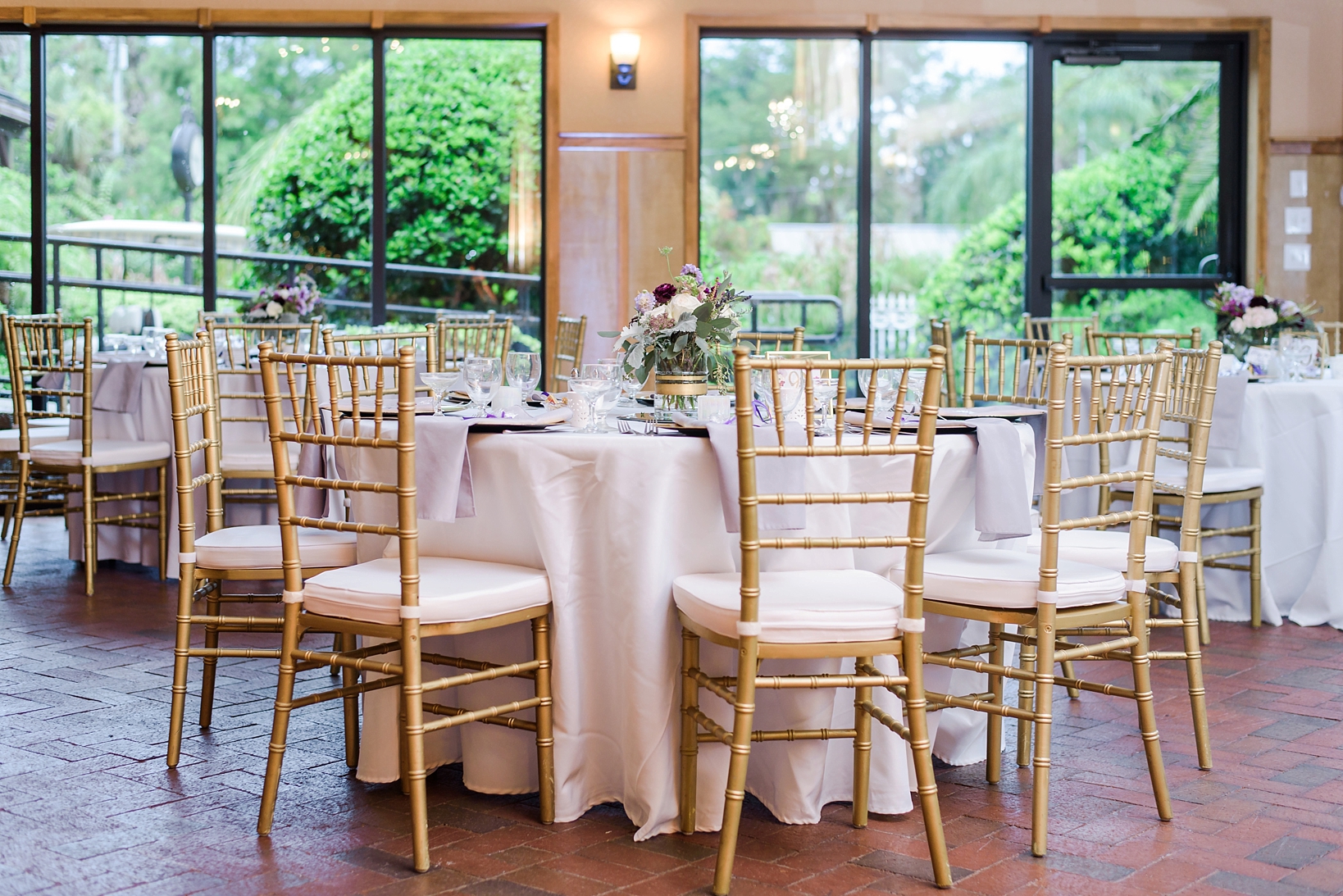 Gold chiavari chairs finished off the room details at this wedding reception