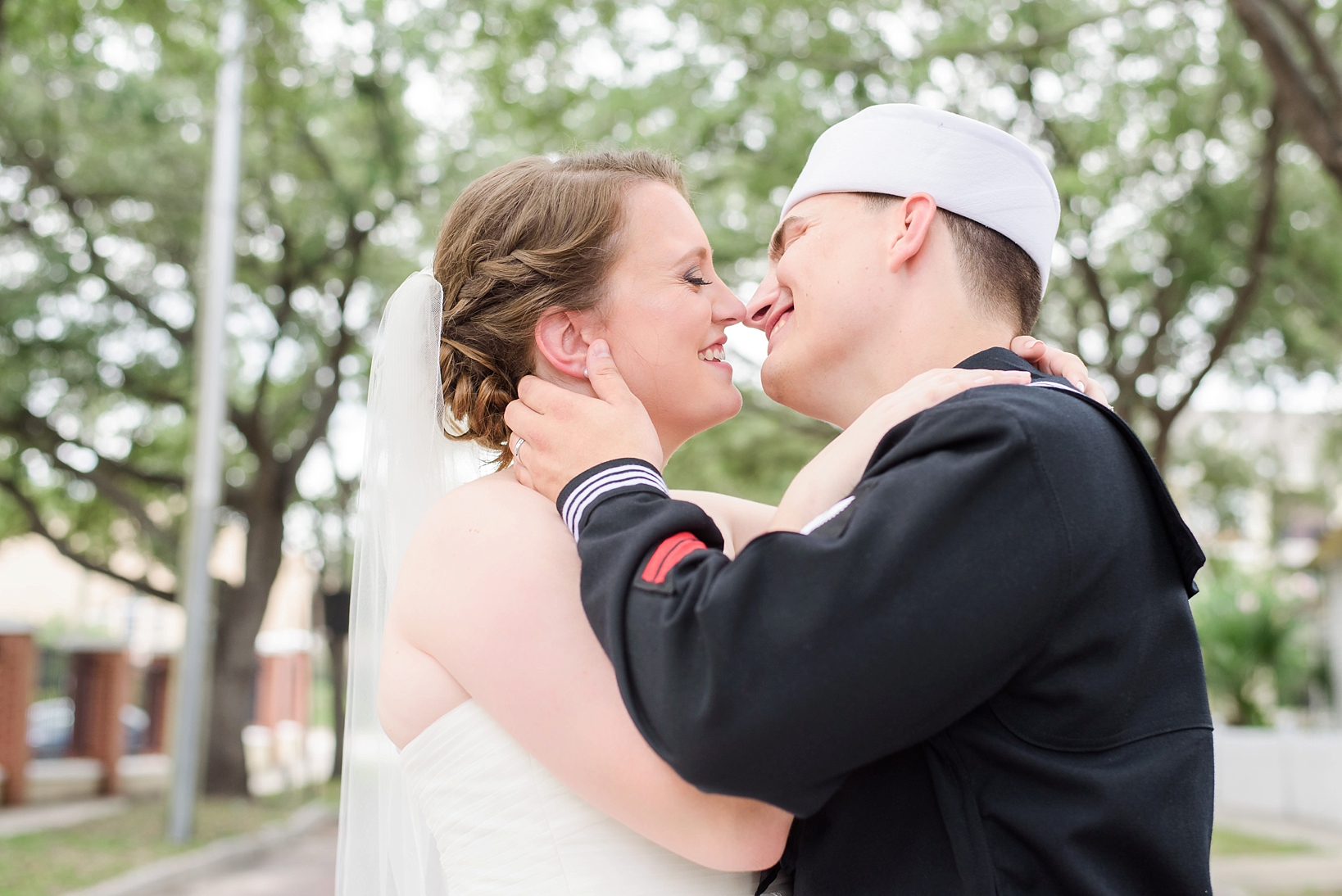 Bride and groom share a laugh before a kiss in Tampa, Florida