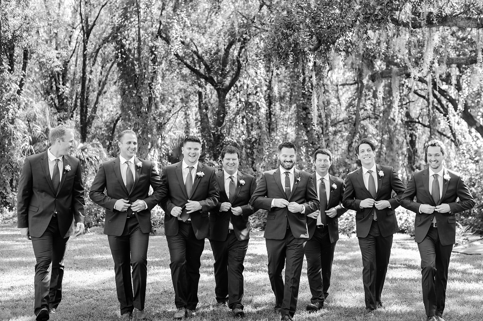 Groom and his groomsmen walking towards the wedding ceremony at Bakers Ranch