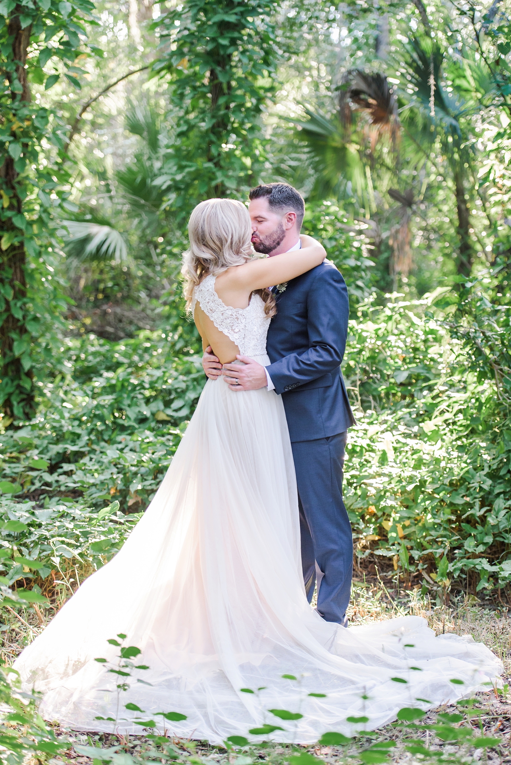 Amazing bridal portraits of the couple in the forest by Sarah and Ben Photography