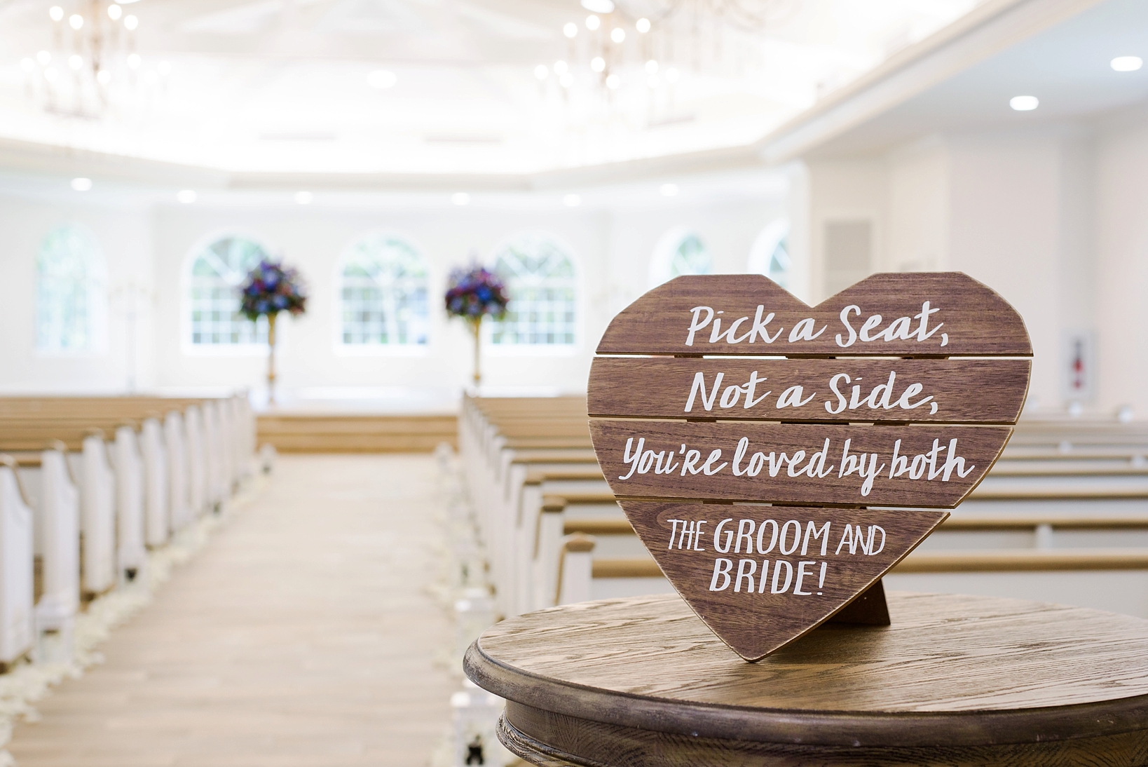 Seating sign in the ceremony space at the Harborside Chapel in Tampa, FL by Sarah & Ben Photography