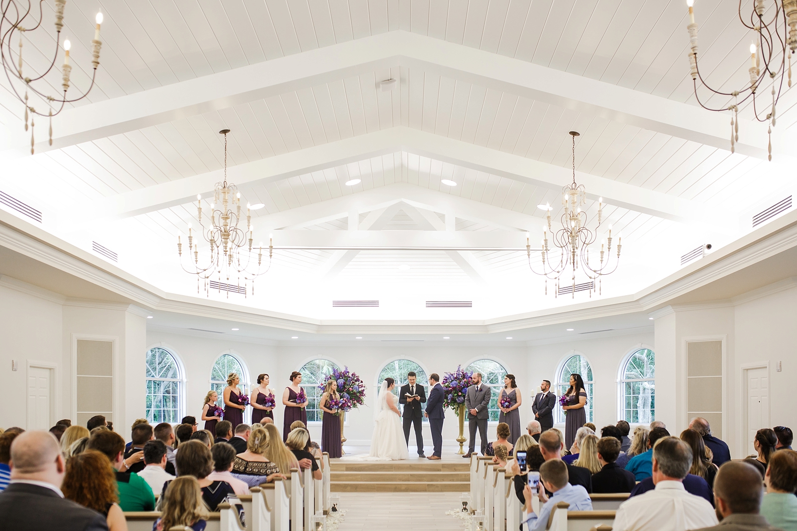 The wedding ceremony at Harborside Chapel by Sarah & Ben Photography