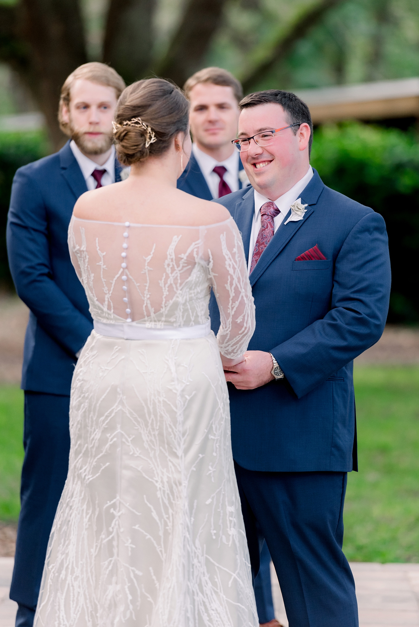 A genuine look from the groom to his bride during the wedding ceremony