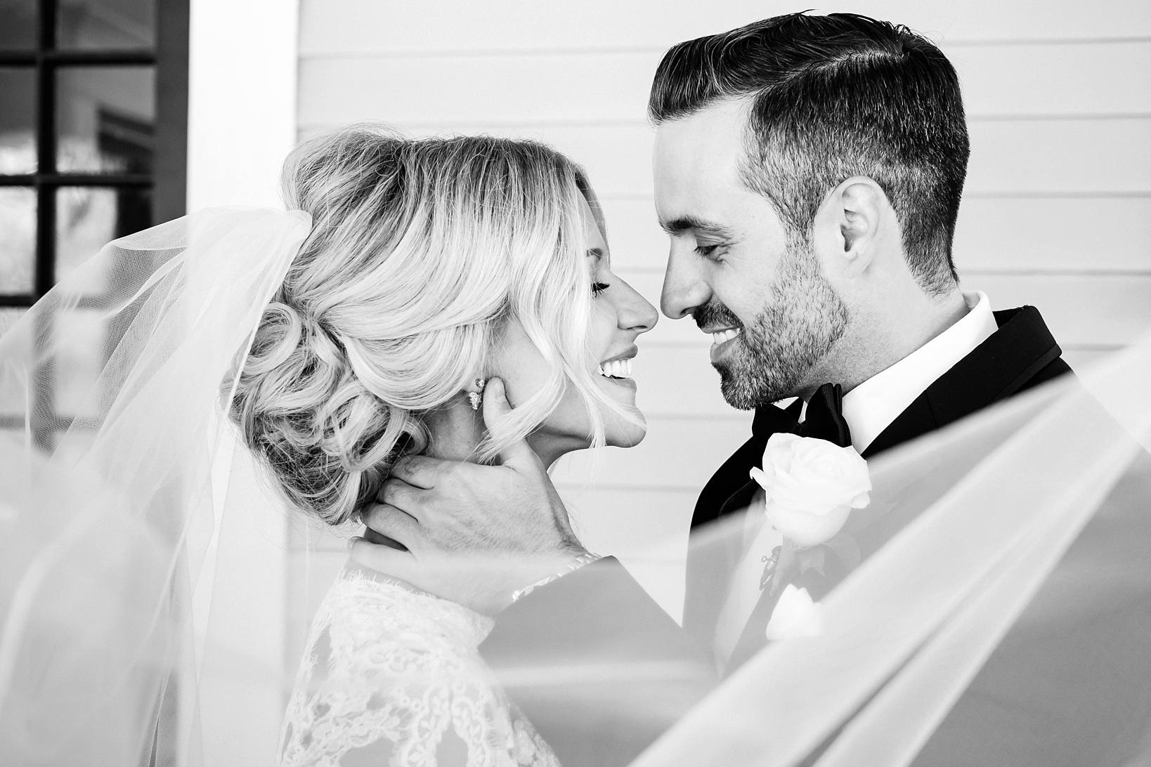 Wedding photo of the bride and groom in timeless black and white by Sarah & Ben Photography