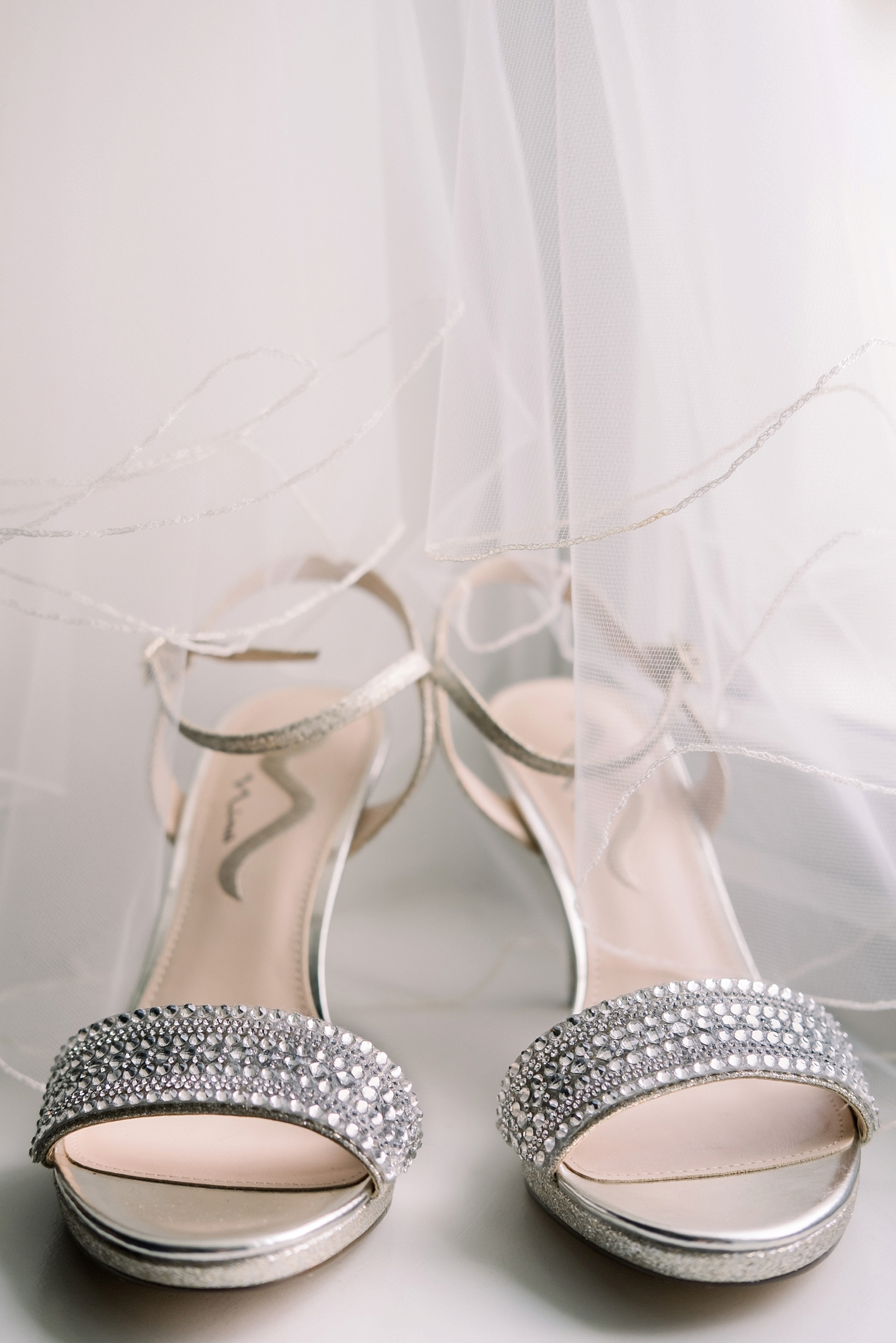 The Bride's shoes and wedding veil