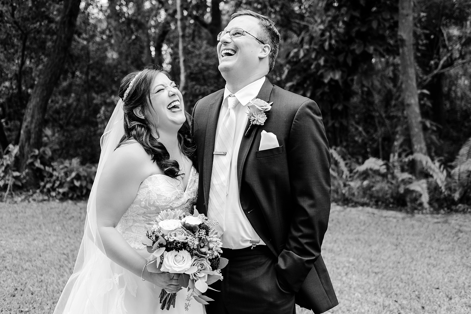 Candid photo of the Bride and Groom laughing at Sarah & Ben Photography