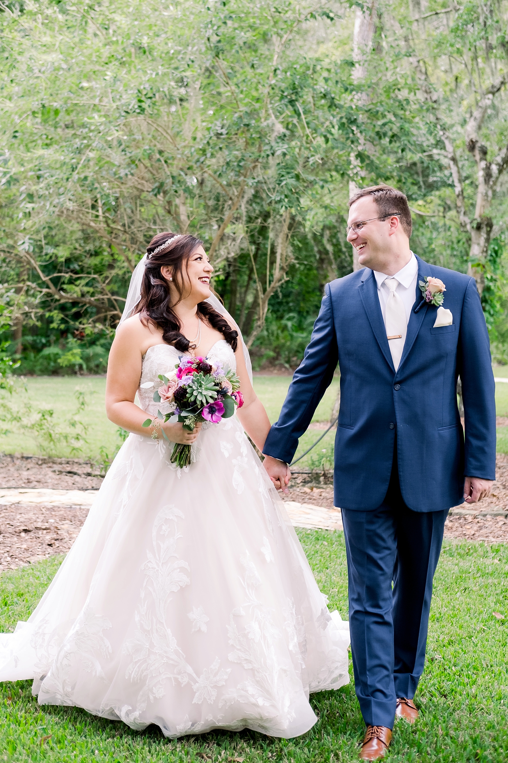Groom escorts his Bride from their first look to their cross creek wedding ceremony