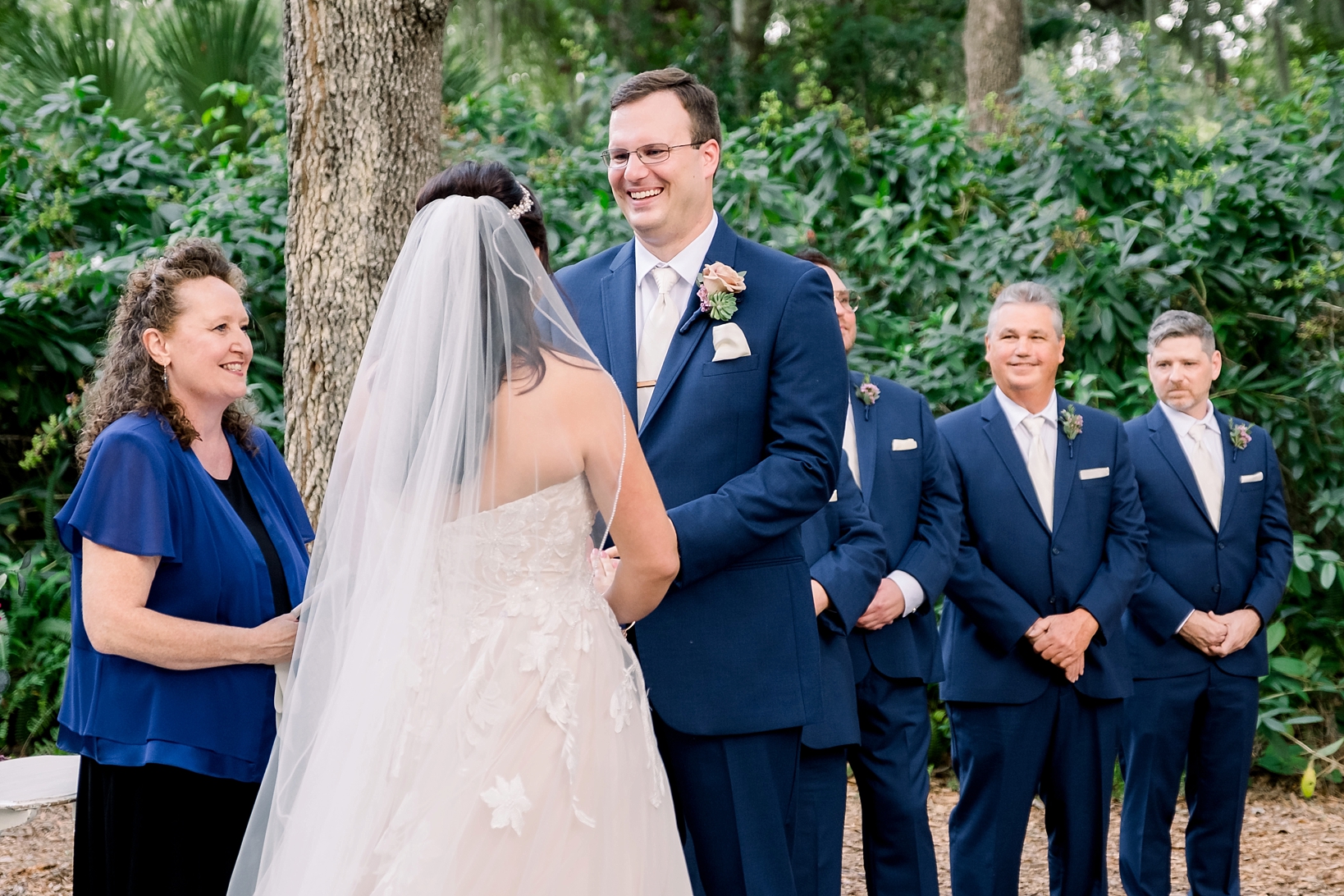 Groom looks into his Bride's eyes during their vows in Seffner, FL