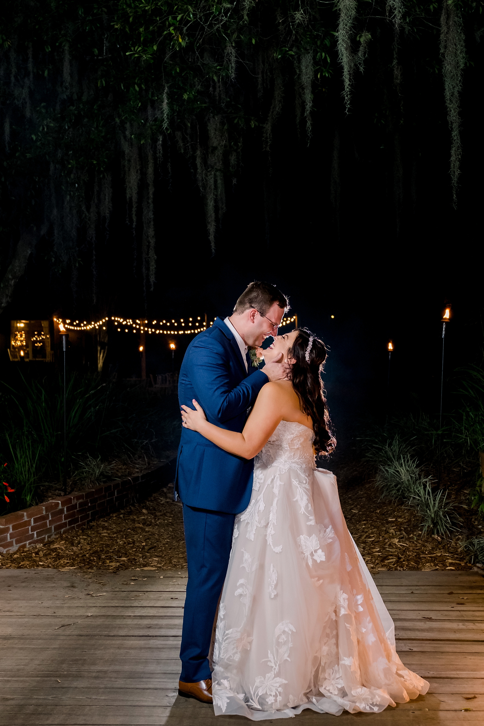 Bride and Groom share a kiss under the stars