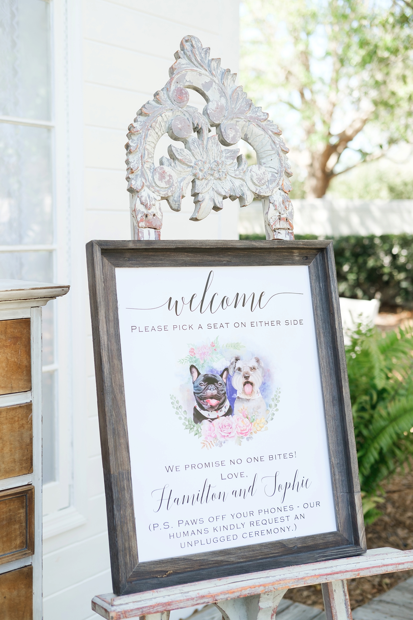 Welcome sign custom made from watercolor paint of the Bride and Groom's dogs