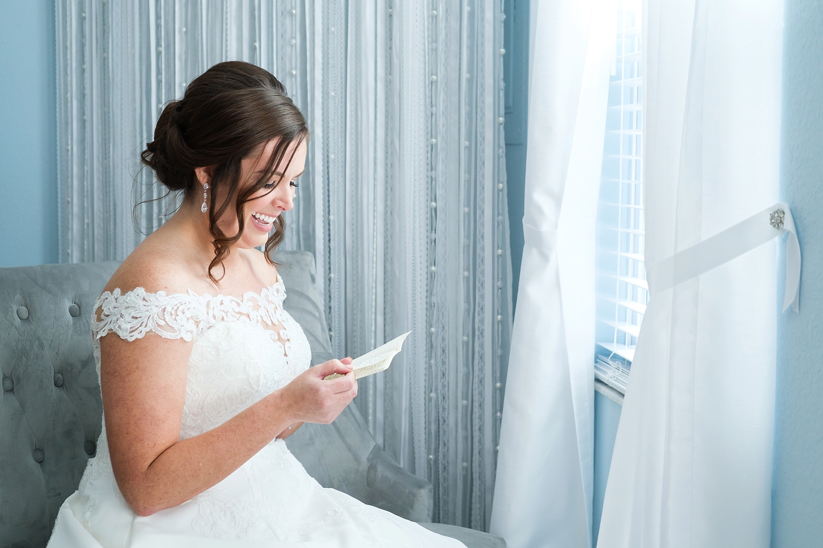 The Bride reads her love letter from her Groom in the Bridal suite at Cross Creek Ranch
