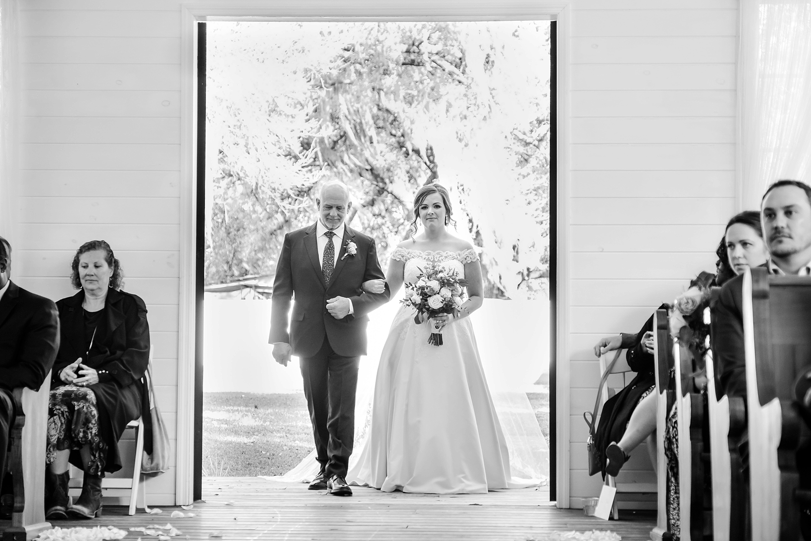 The Bride and her Dad coming through the chapel doors