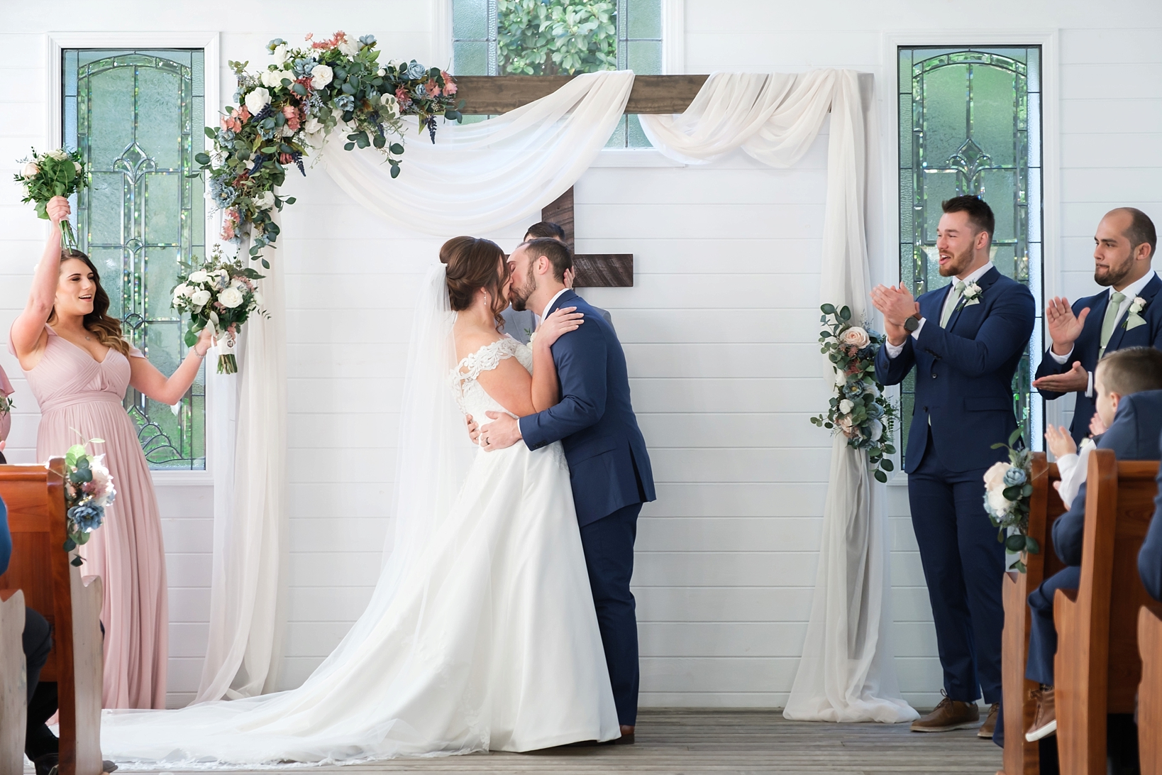 Bride and Groom kiss for the first time as Man and Wife