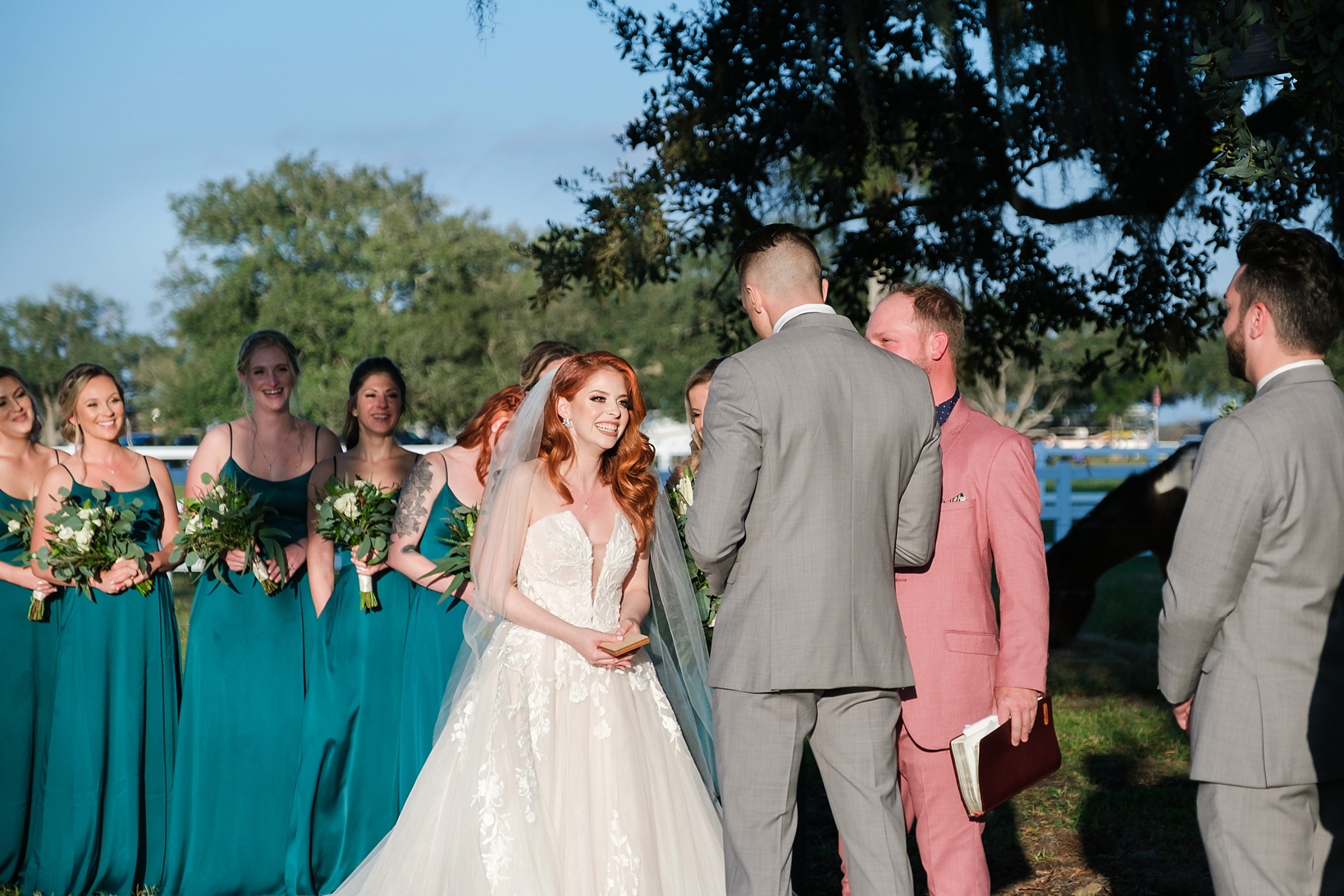 Bride laughing at her Groom during his hilarious vows