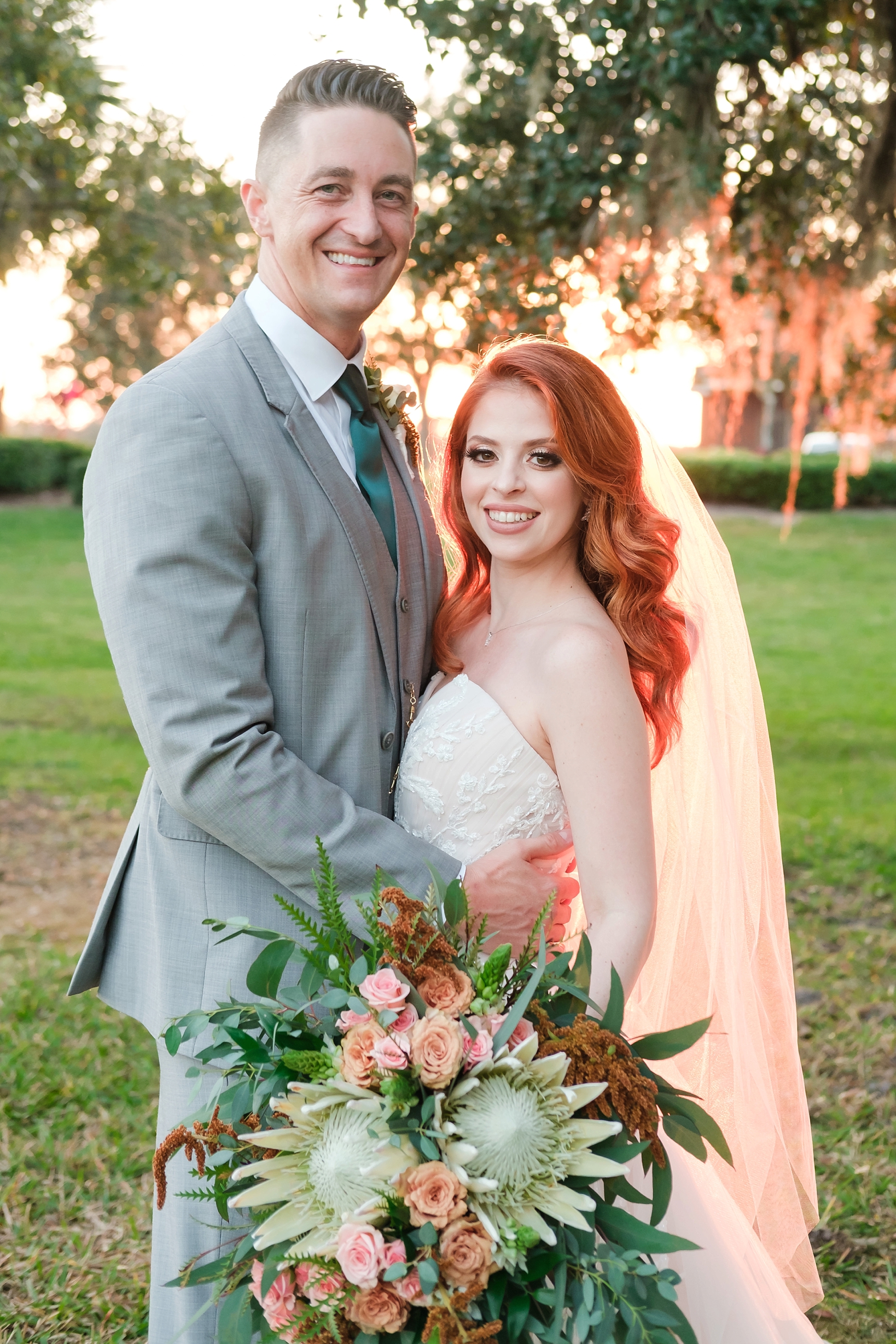 Bridal portrait of the married couple with the golden hour sunlight filling the background