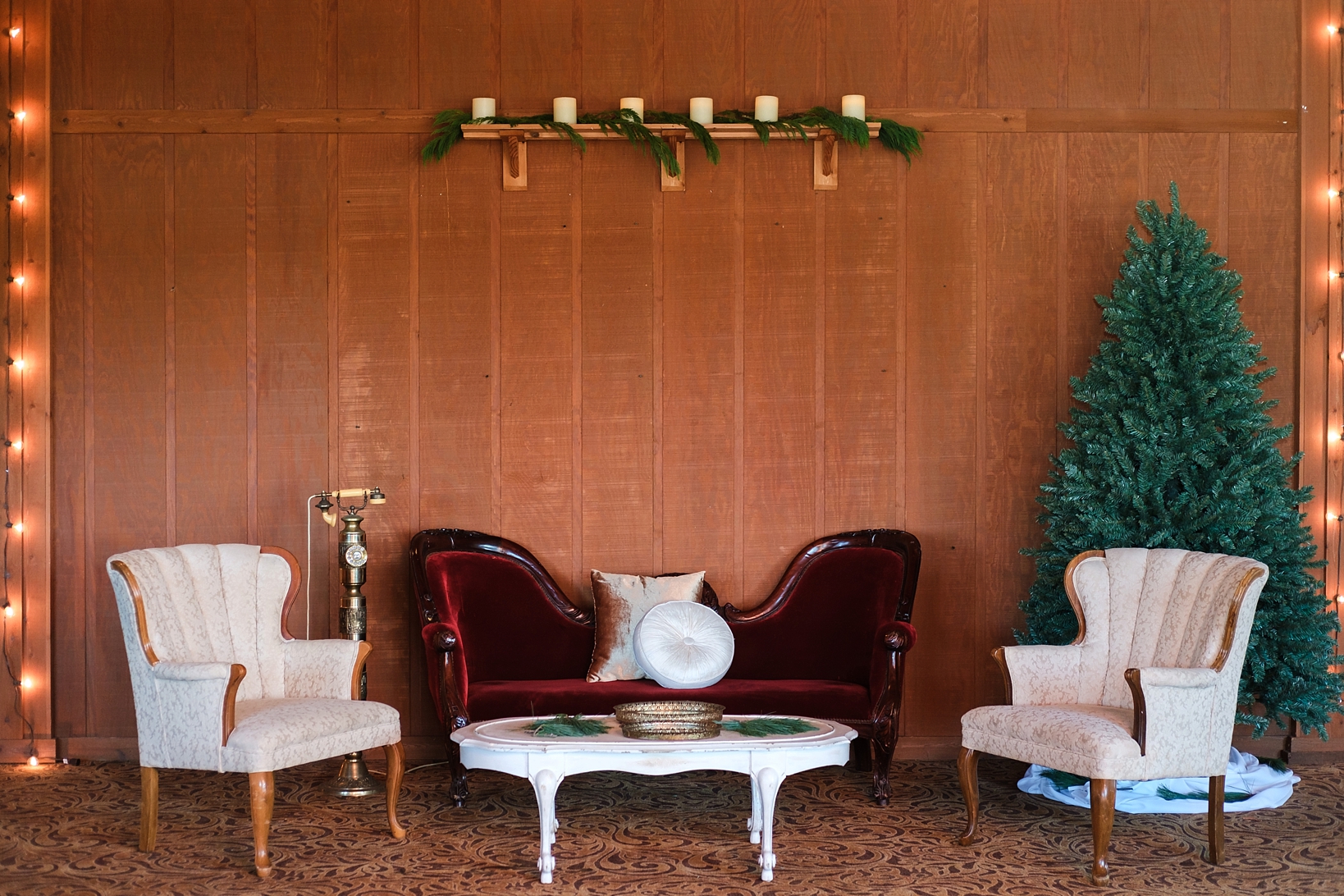 A seating area during the reception with vintage furniture
