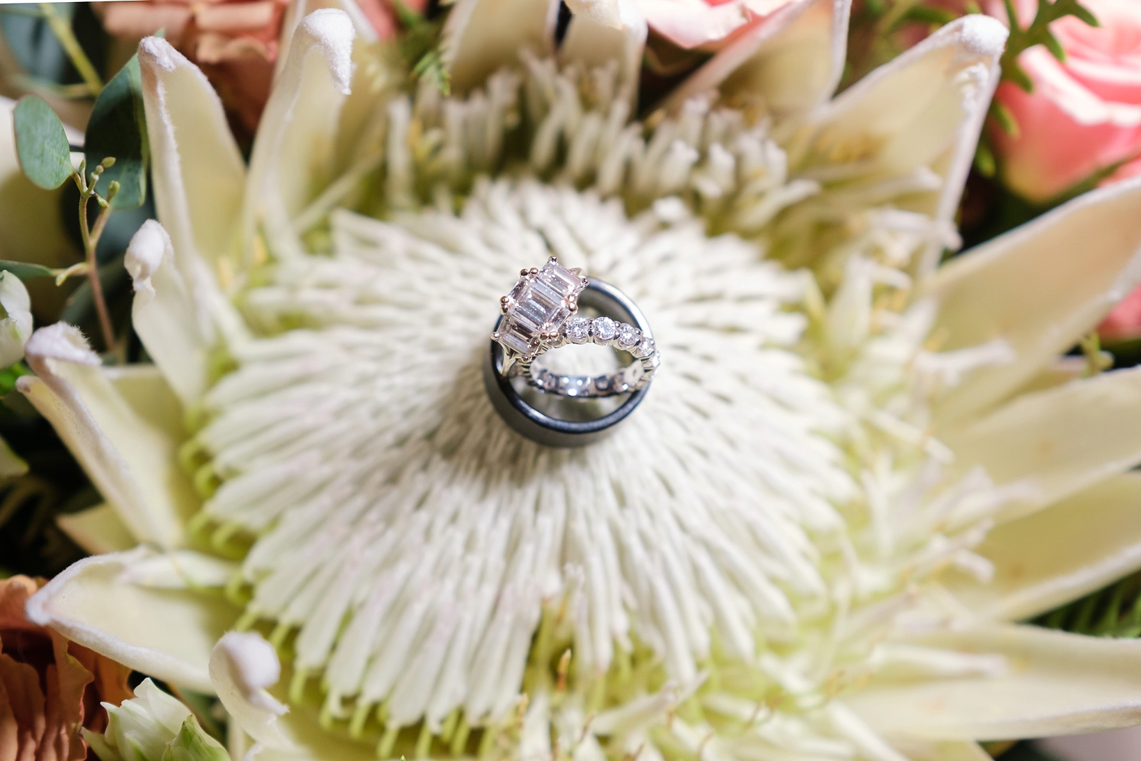The wedding bands photographed on the Brides floral bouquet 
